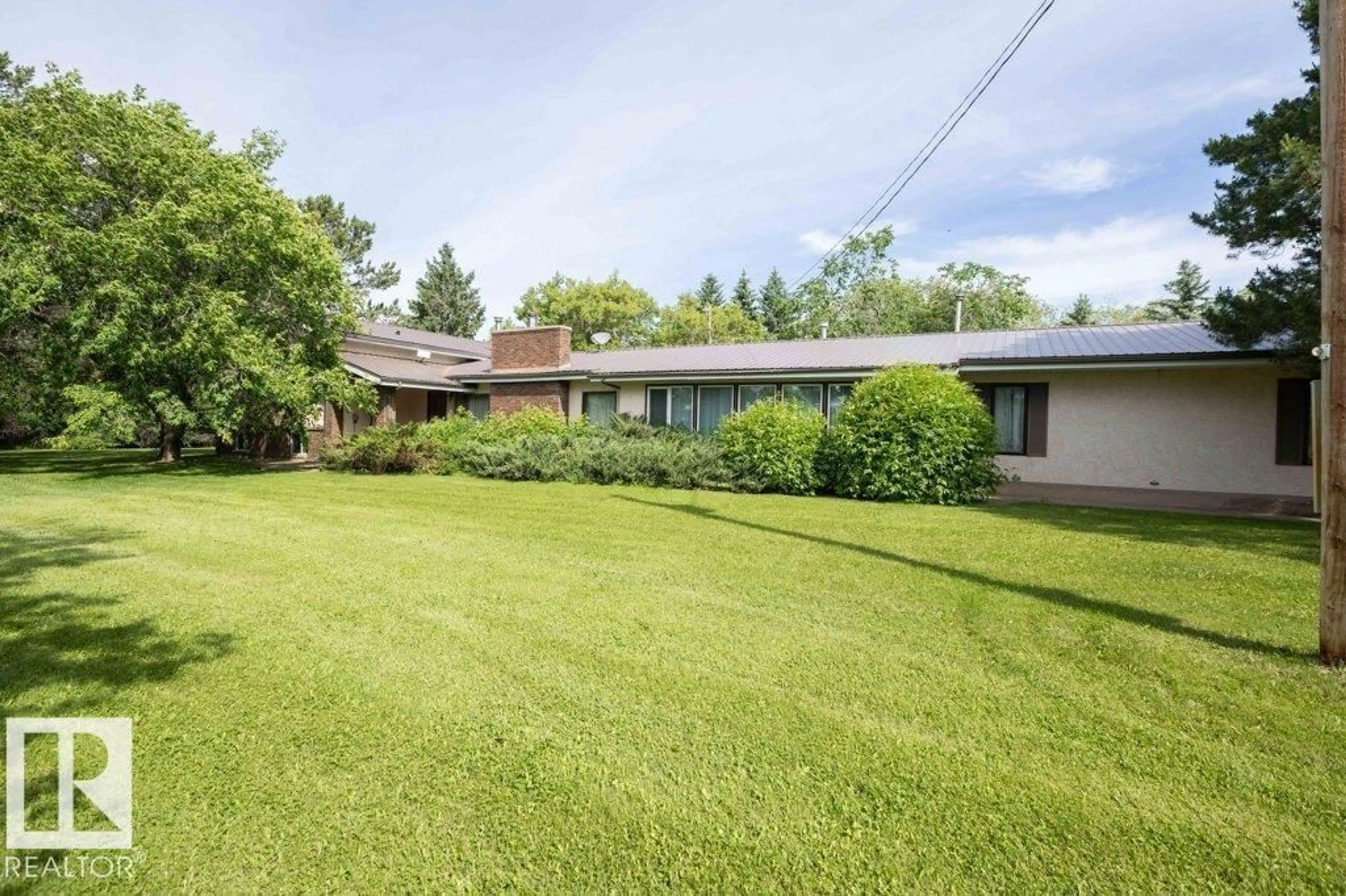 A pic from outside/outdoor area/front of a property/back of a property/a pic from drone, unknown for 26530 TWP RD 590, Rural Westlock County Alberta T0G1W0