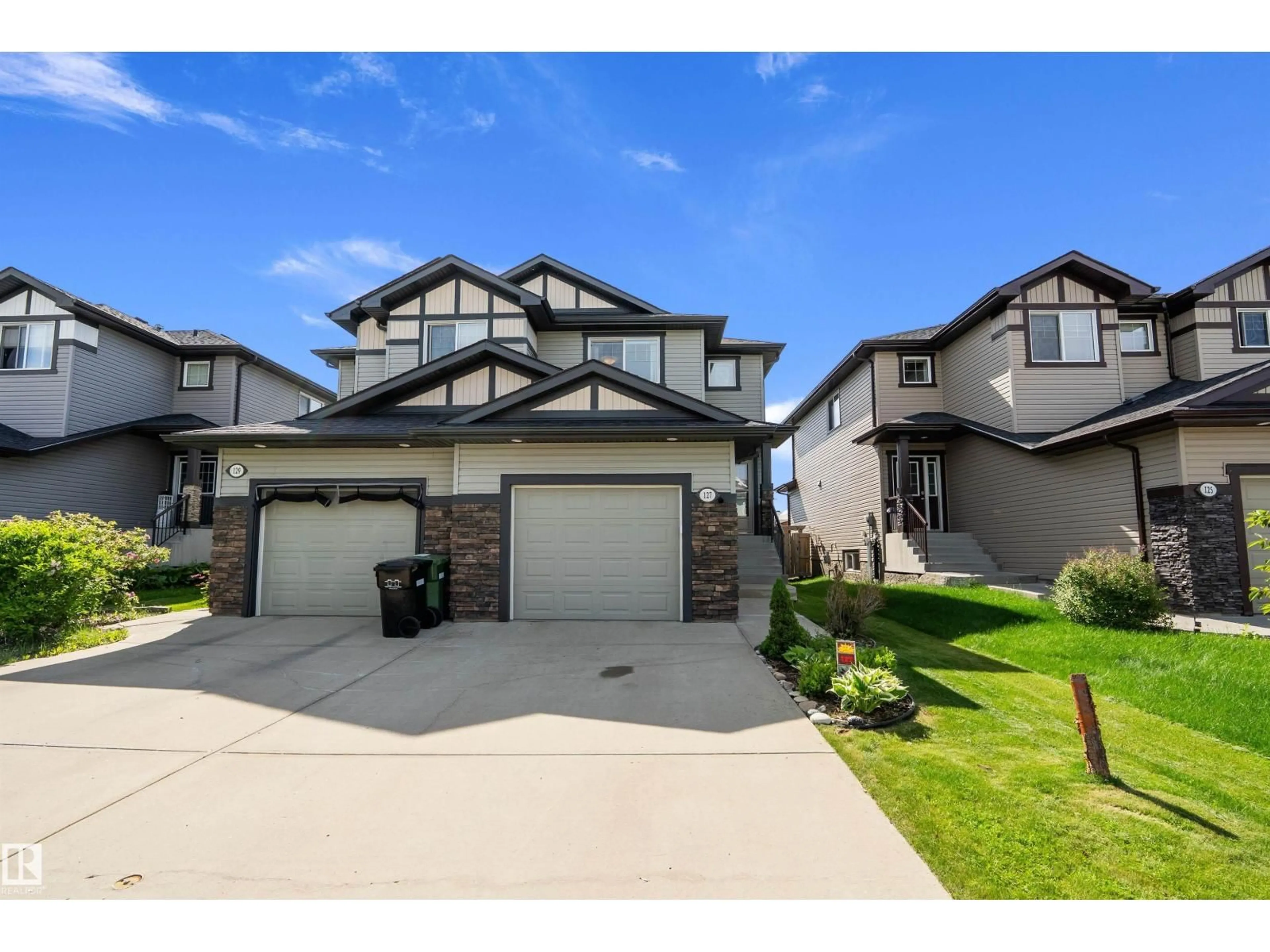 A pic from outside/outdoor area/front of a property/back of a property/a pic from drone, street for 127 REED PL, Leduc Alberta T9E1B1