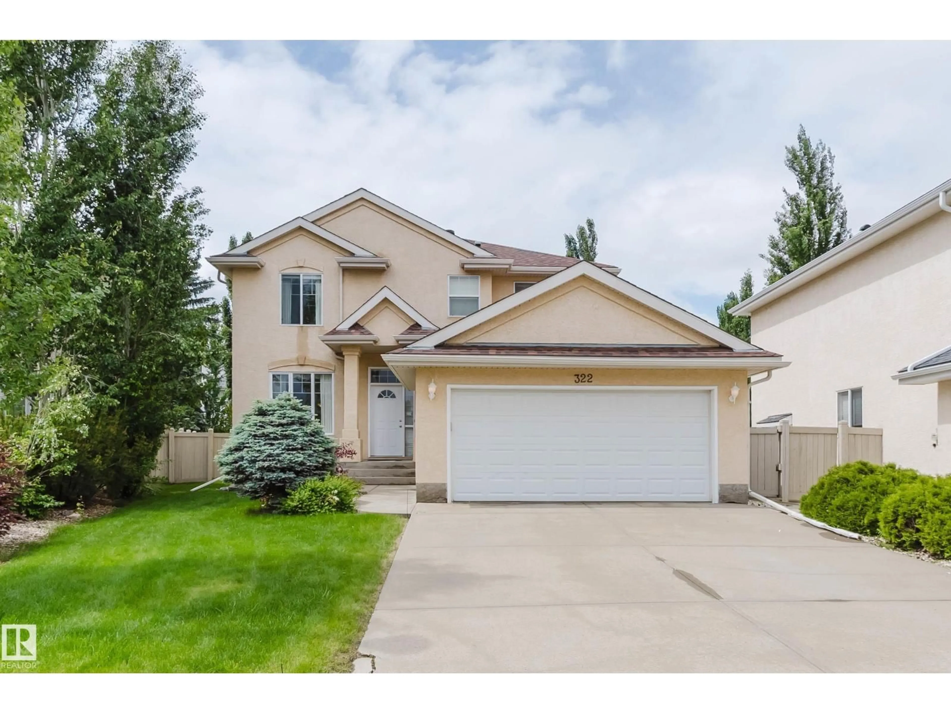 Home with vinyl exterior material, street for 322 LIVINGSTONE CT, Edmonton Alberta T6R2T1