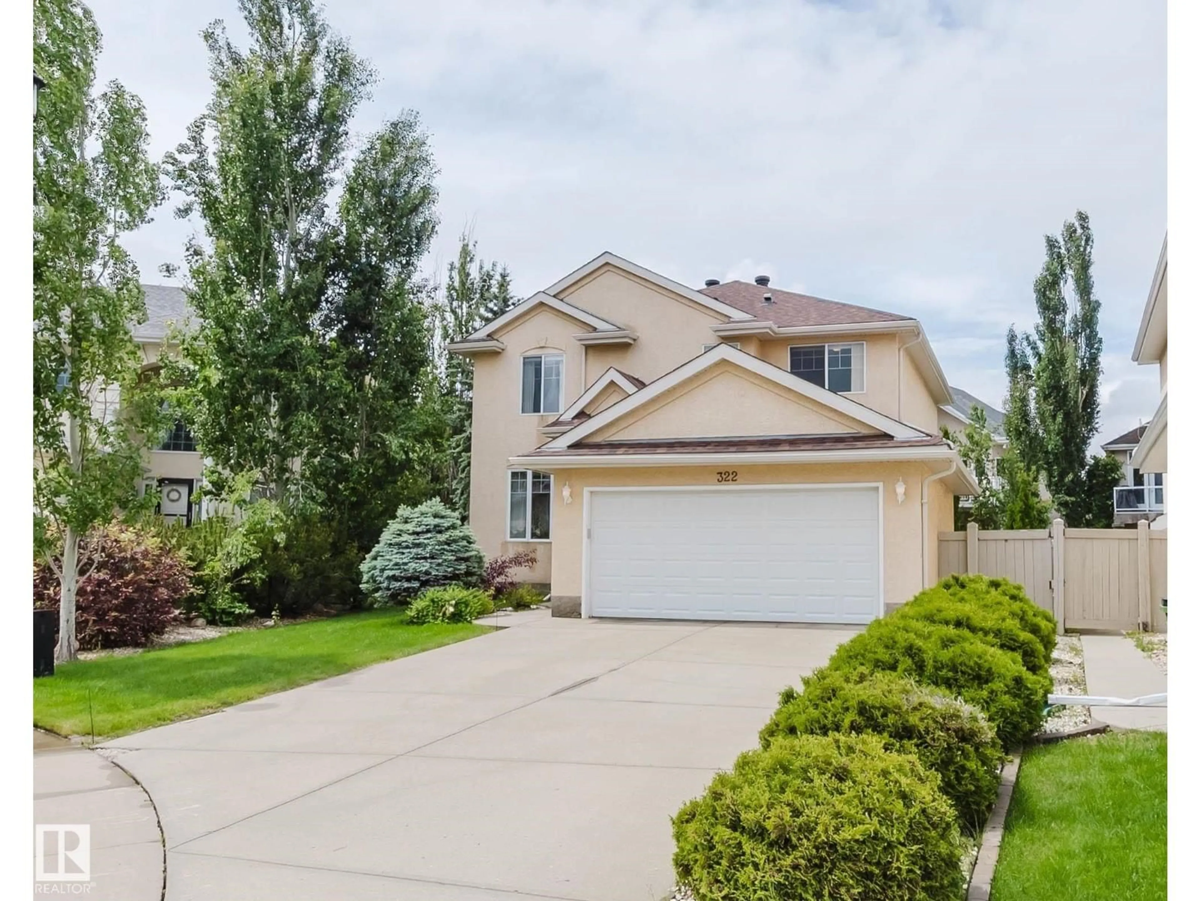 Home with vinyl exterior material, street for 322 LIVINGSTONE CT, Edmonton Alberta T6R2T1