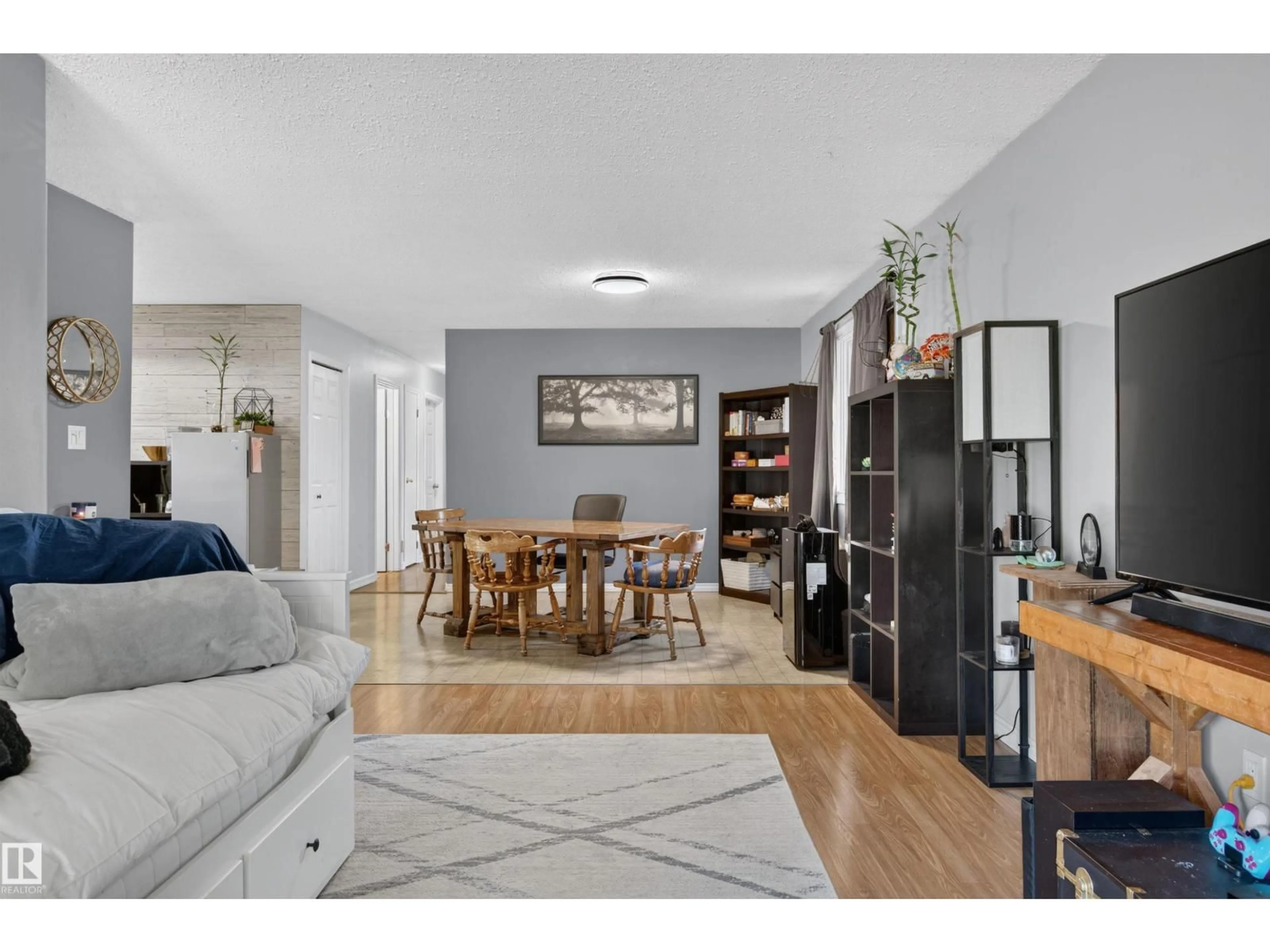 Living room with furniture, wood/laminate floor for 5017 45 ST, Cold Lake Alberta T9M1Z2