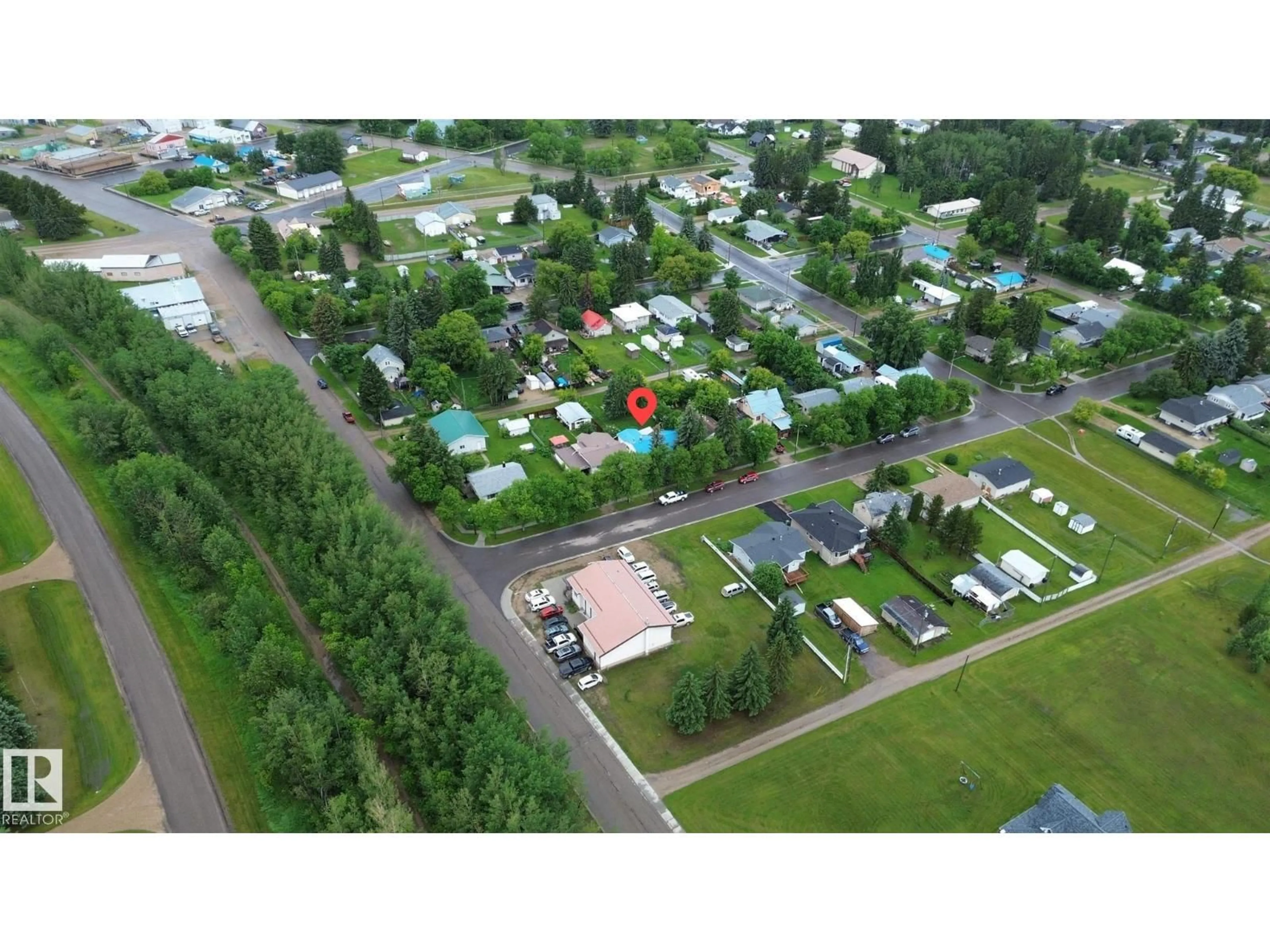 A pic from outside/outdoor area/front of a property/back of a property/a pic from drone, street for 5012 48 STREET, Warburg Alberta T0C2T0
