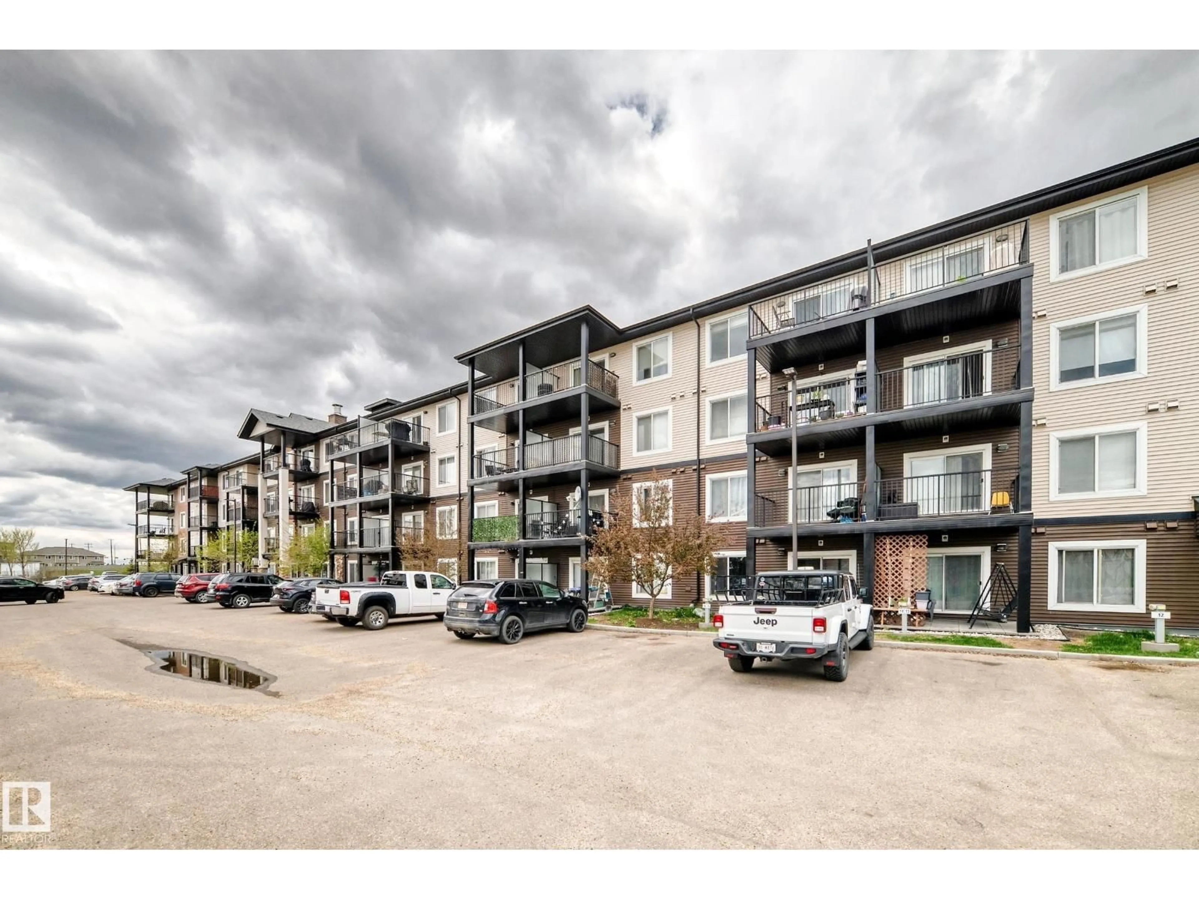 A pic from outside/outdoor area/front of a property/back of a property/a pic from drone, unknown for 142 - 311 EBBERS BV, Edmonton Alberta T5Y3W2