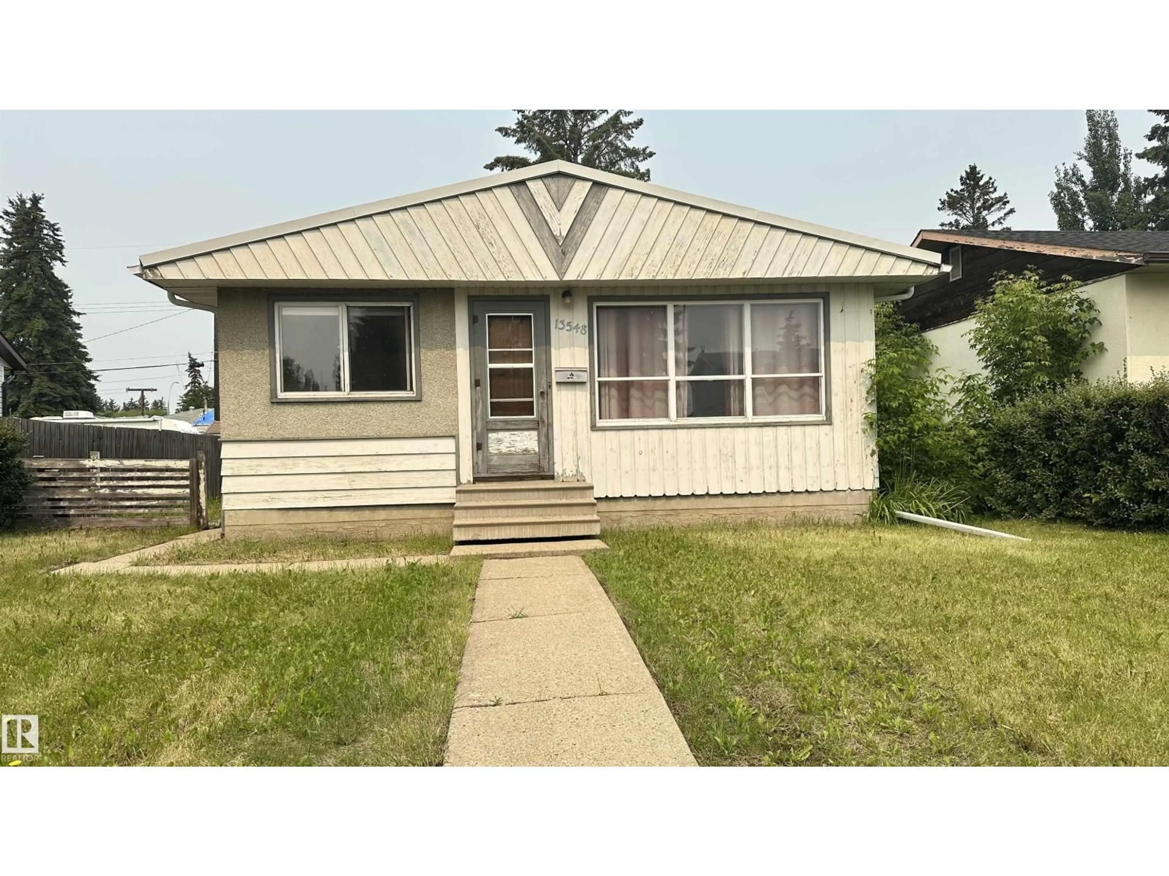 Home with vinyl exterior material, street for NW - 13548 126 ST, Edmonton Alberta T5L0Y8