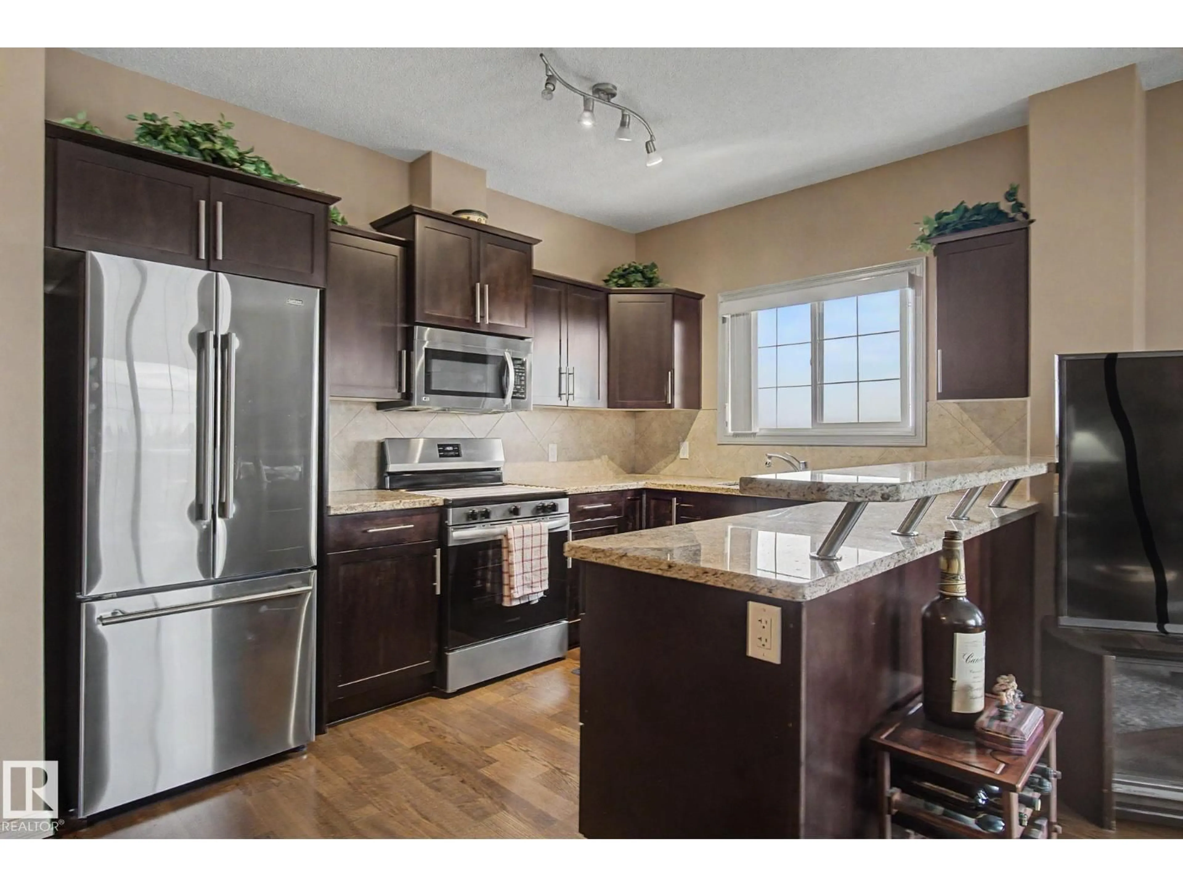 Open concept kitchen, unknown for 263 MACEWAN RD, Edmonton Alberta T6W0C4