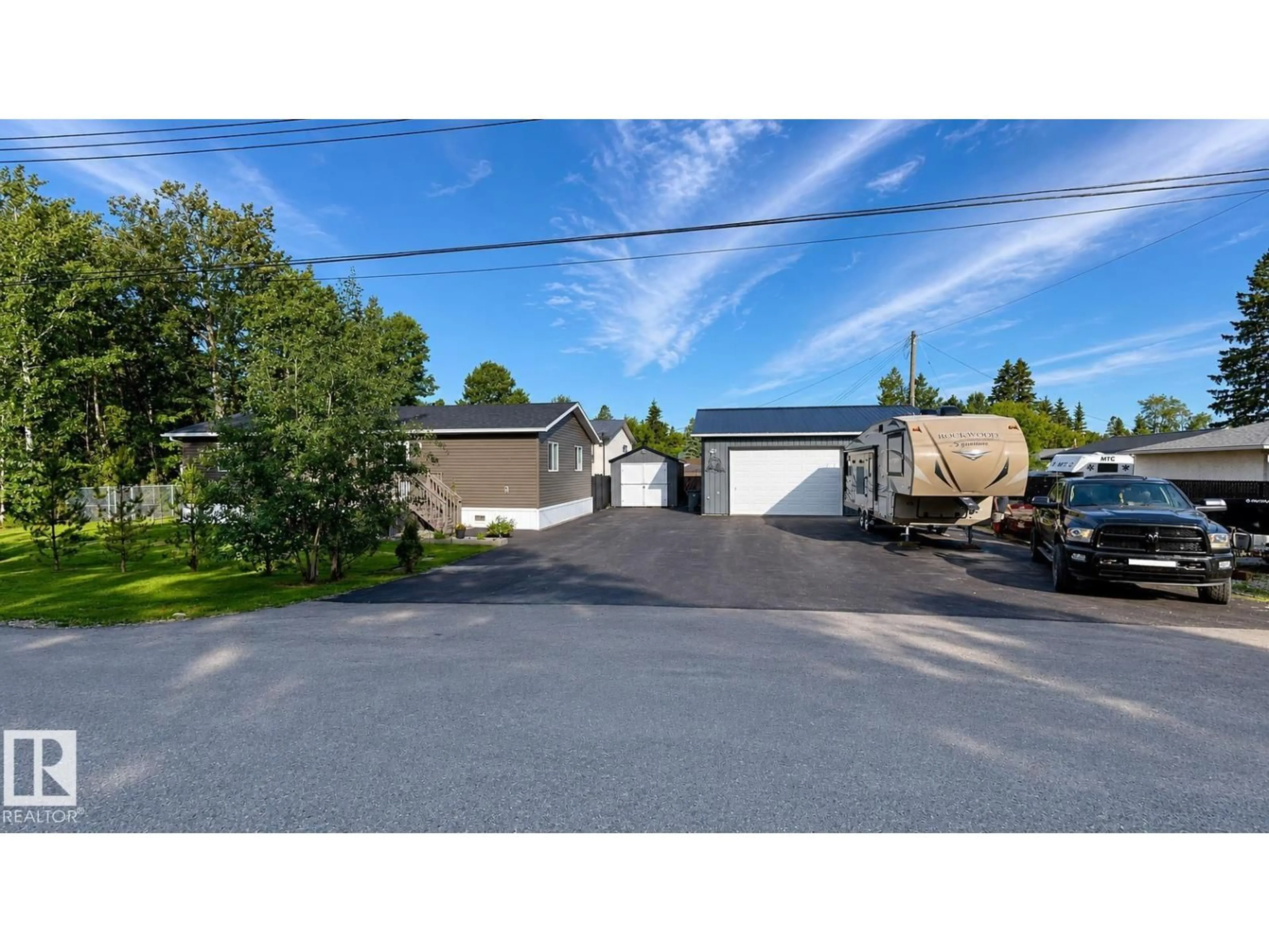 A pic from outside/outdoor area/front of a property/back of a property/a pic from drone, street for 4707 52A ST, Rural Lac Ste. Anne County Alberta T0E0A0
