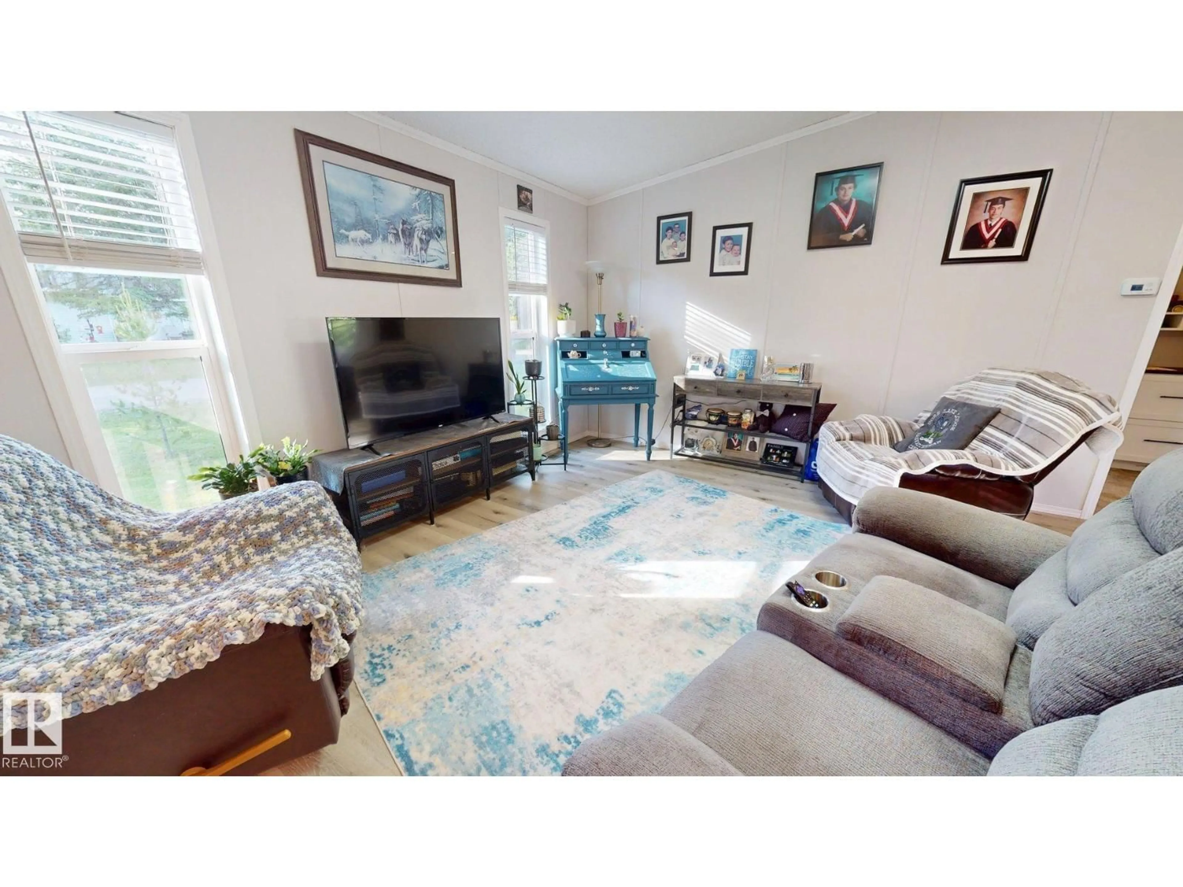 Living room with furniture, unknown for 4707 52A ST, Rural Lac Ste. Anne County Alberta T0E0A0