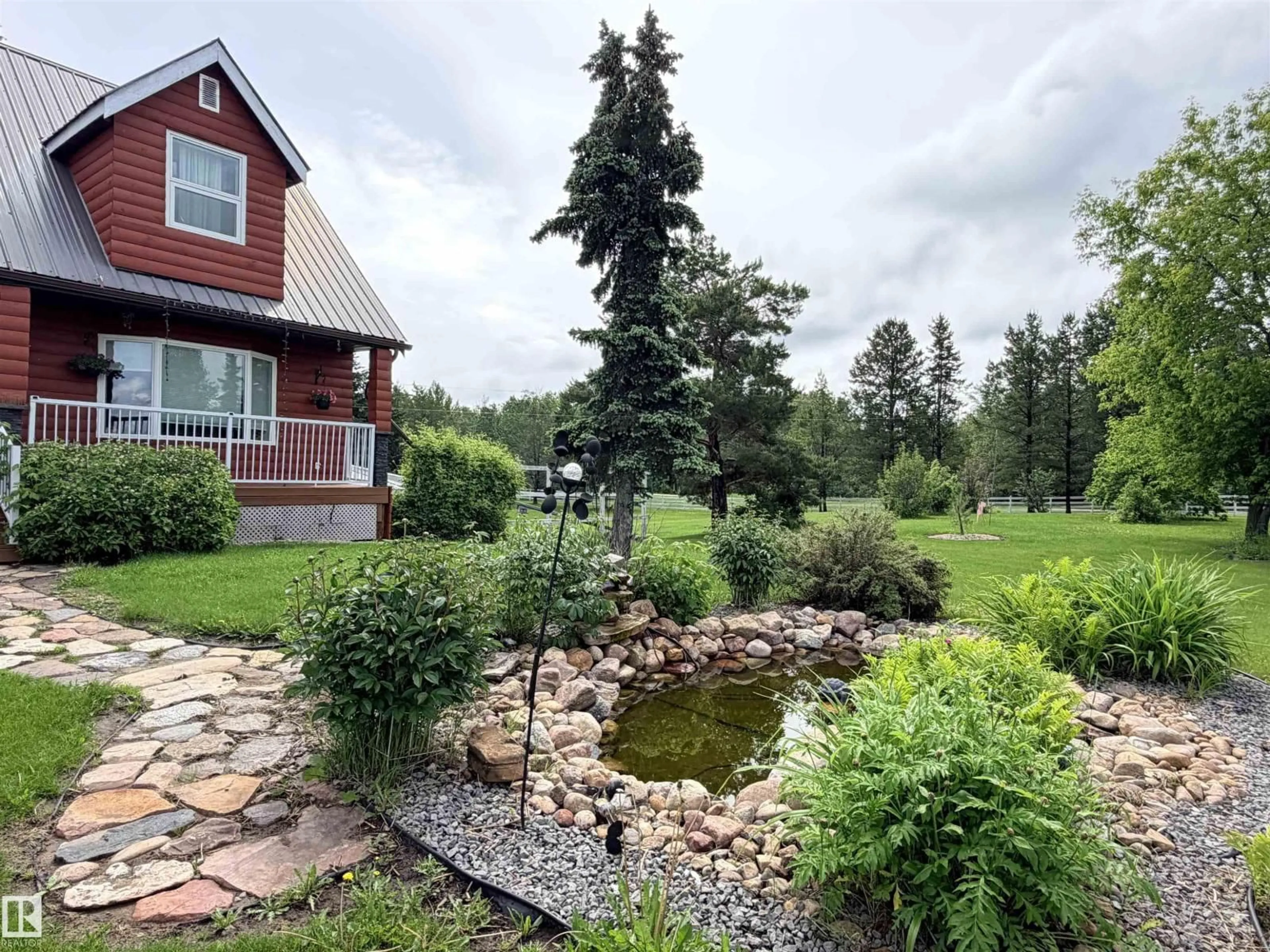 A pic from outside/outdoor area/front of a property/back of a property/a pic from drone, water/lake/river/ocean view for 26418 TWP RD 633, Rural Westlock County Alberta T0G1H0