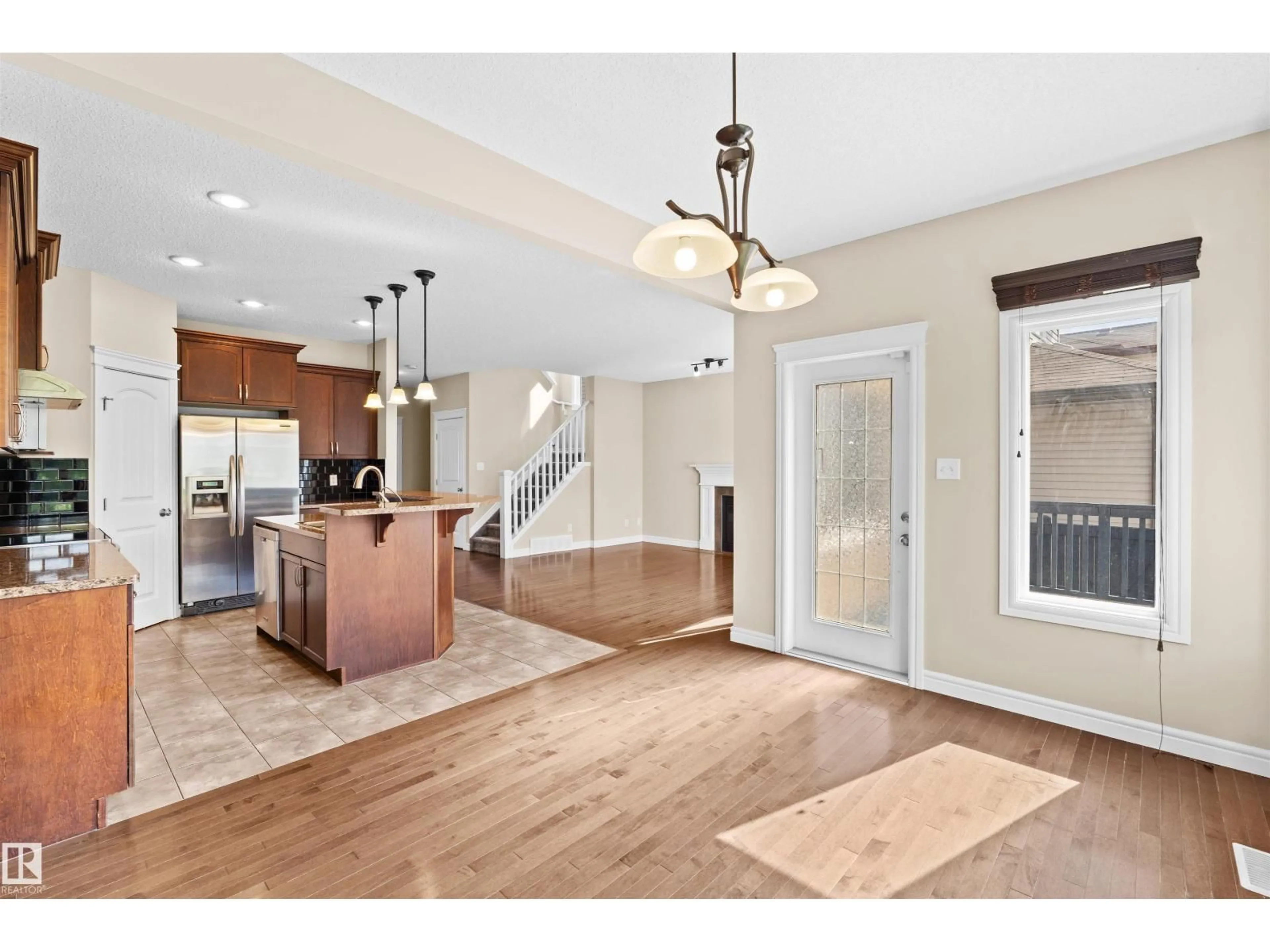 Open concept kitchen, unknown for 11711 16 AVE SW, Edmonton Alberta T6W1M9