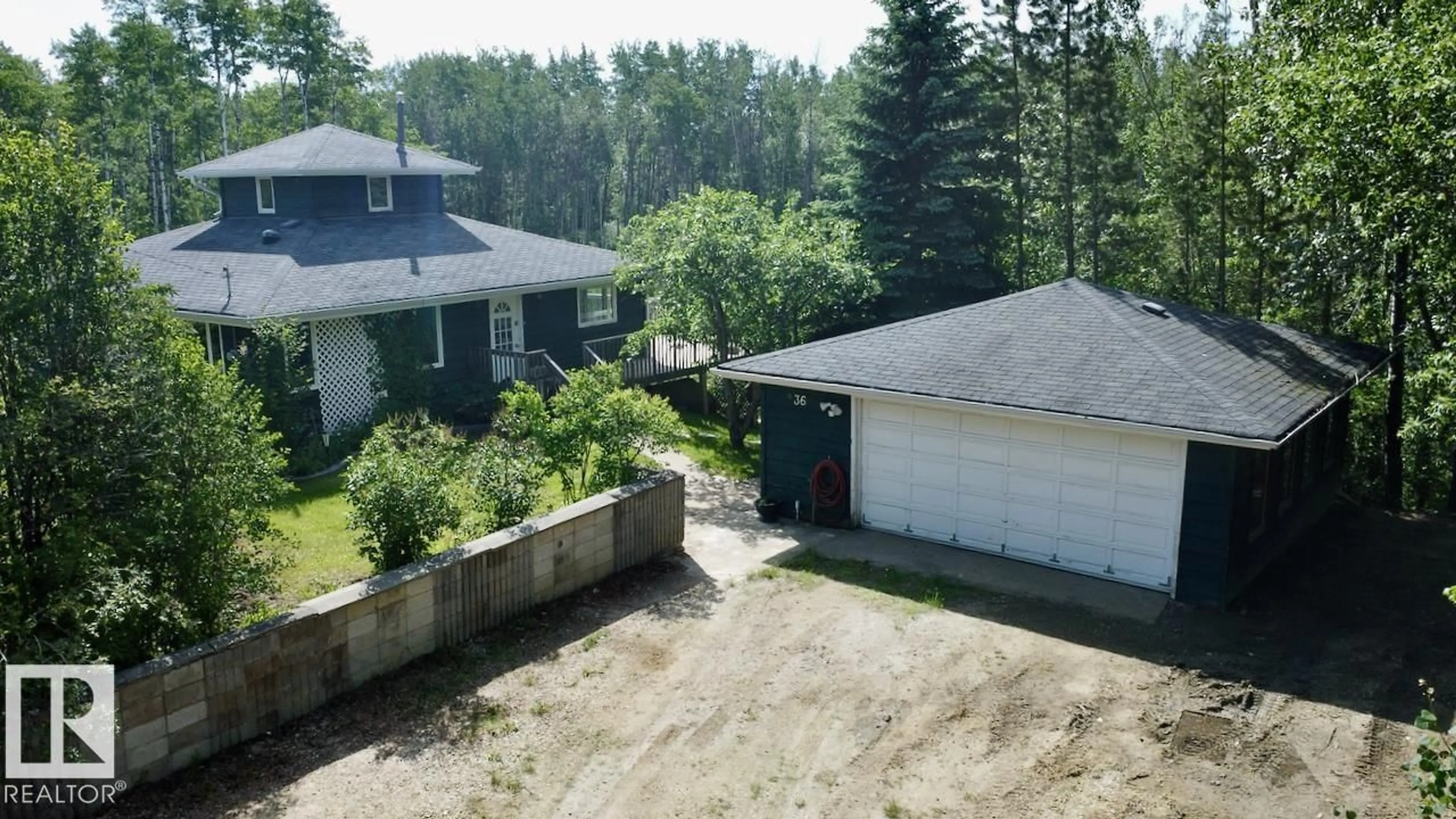 A pic from outside/outdoor area/front of a property/back of a property/a pic from drone, unknown for 53304 - 36 RGE ROAD 14, Rural Parkland County Alberta T7Y0C2