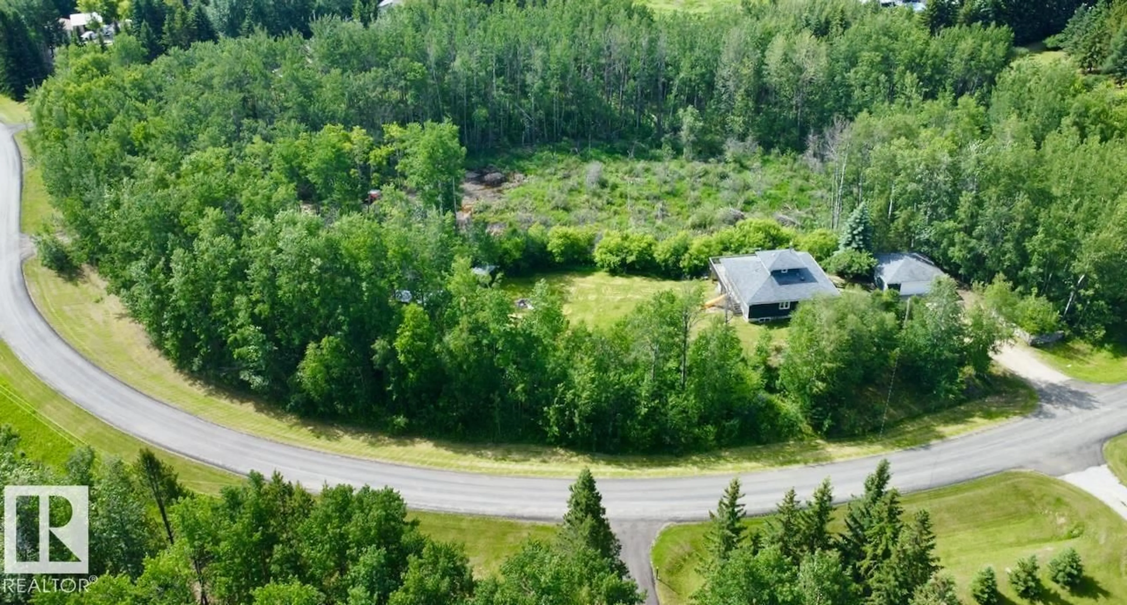 A pic from outside/outdoor area/front of a property/back of a property/a pic from drone, forest/trees view for 53304 - 36 RGE ROAD 14, Rural Parkland County Alberta T7Y0C2