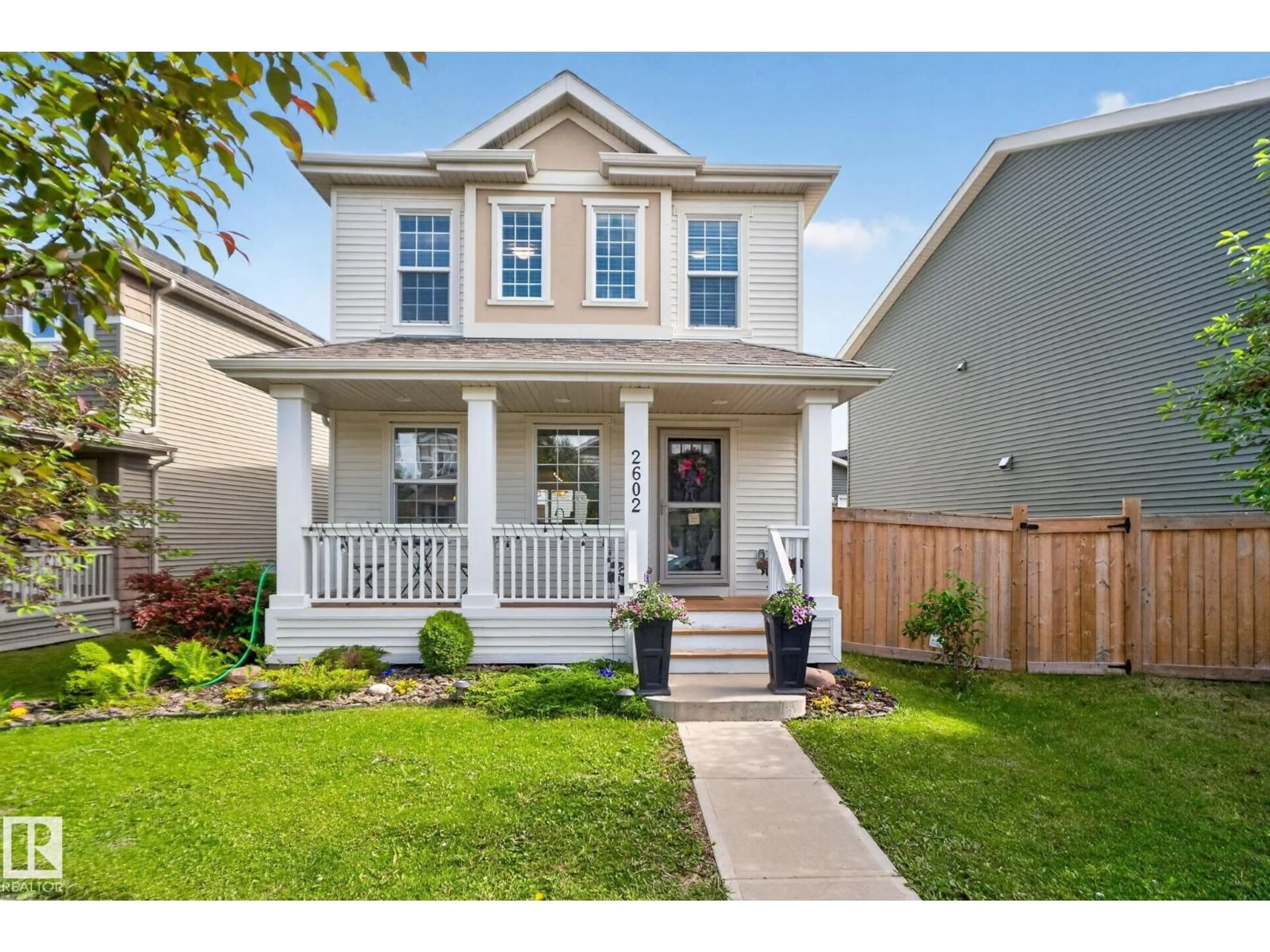 Home with vinyl exterior material, street for 2602 COUGHLAN RD, Edmonton Alberta T6W3S1