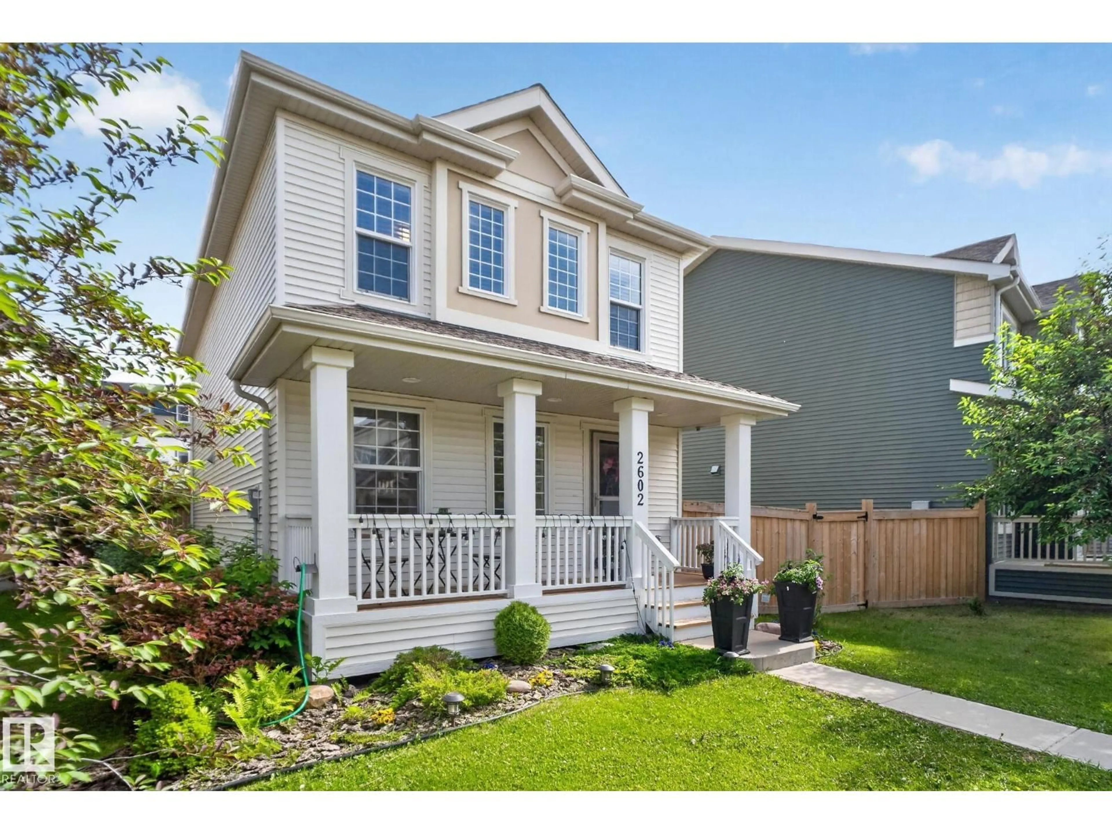 Home with vinyl exterior material, street for 2602 COUGHLAN RD, Edmonton Alberta T6W3S1