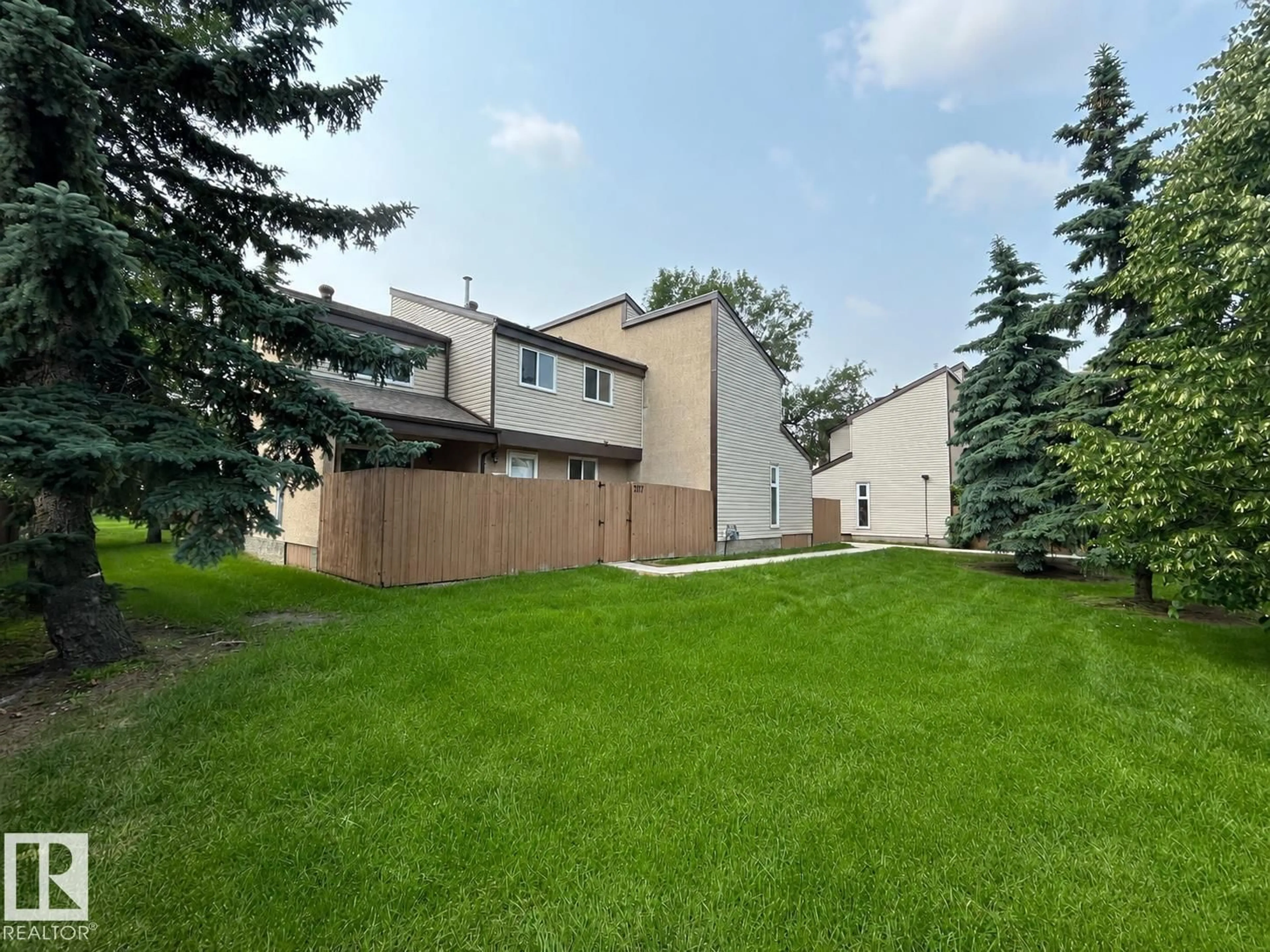 A pic from outside/outdoor area/front of a property/back of a property/a pic from drone, unknown for NW - 7117 180 ST, Edmonton Alberta T5T3G1
