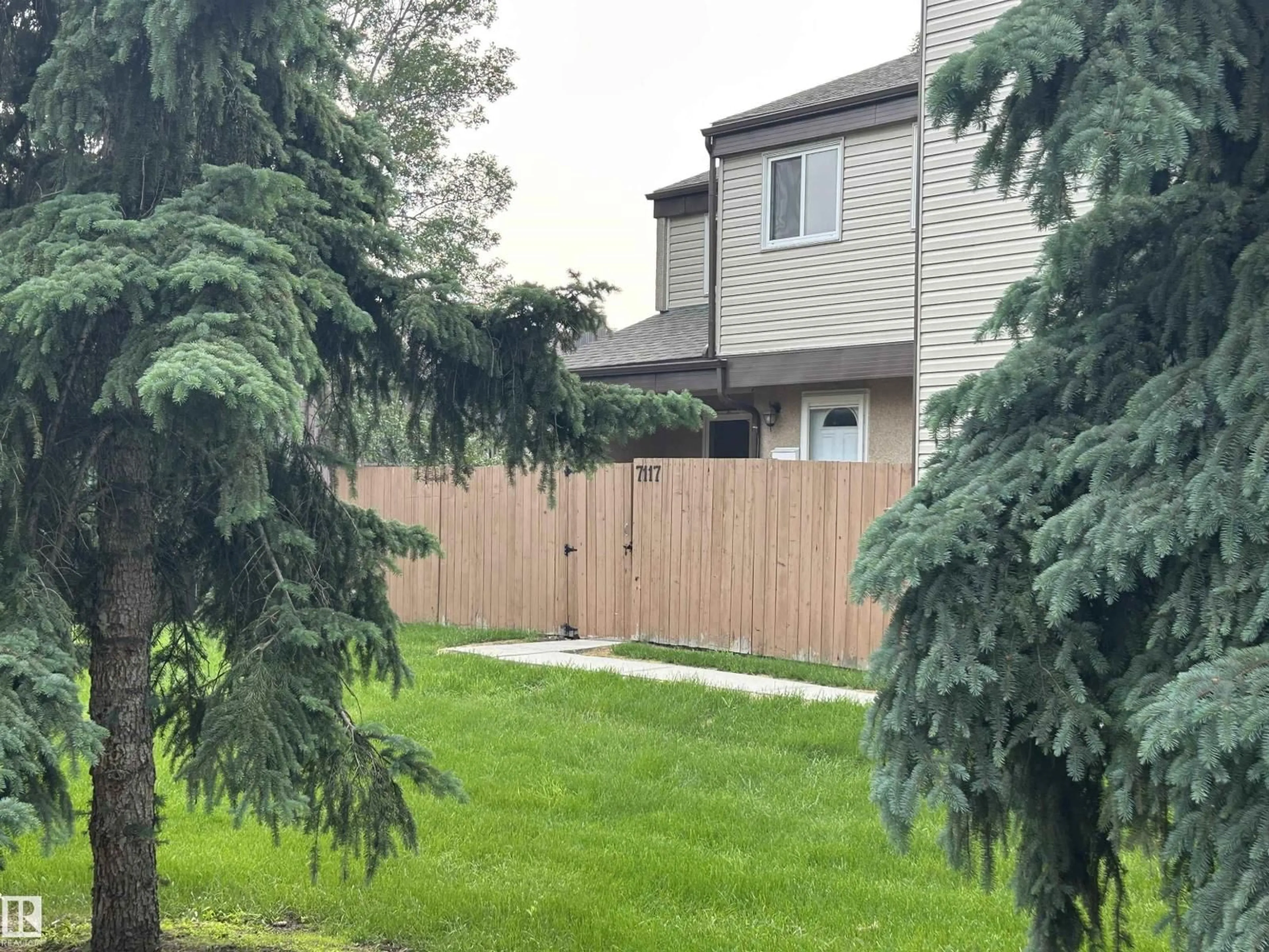 A pic from outside/outdoor area/front of a property/back of a property/a pic from drone, unknown for NW - 7117 180 ST, Edmonton Alberta T5T3G1