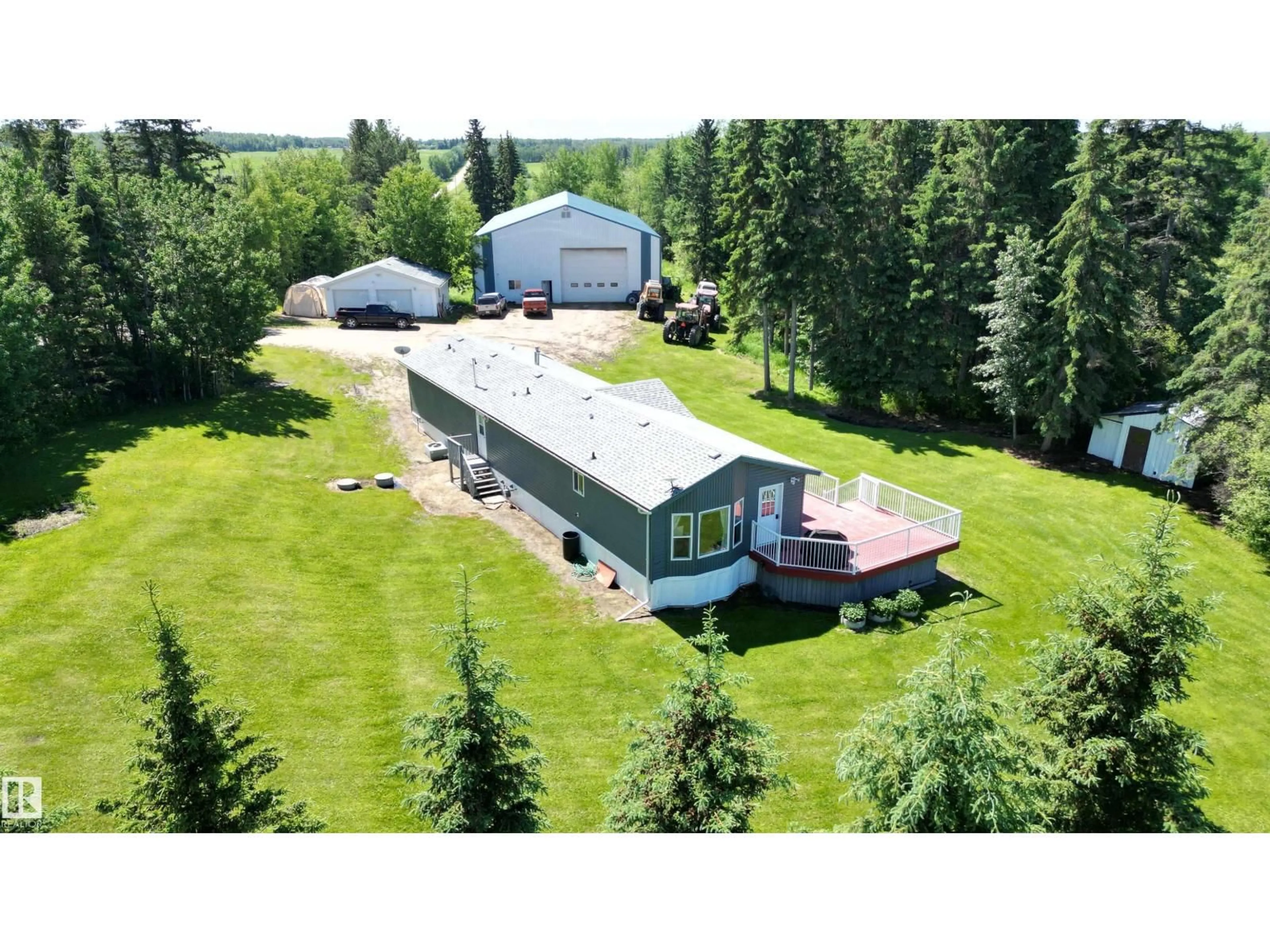 A pic from outside/outdoor area/front of a property/back of a property/a pic from drone, building for 56326 RGE RD 65, Rural Lac Ste. Anne County Alberta T0E2A0