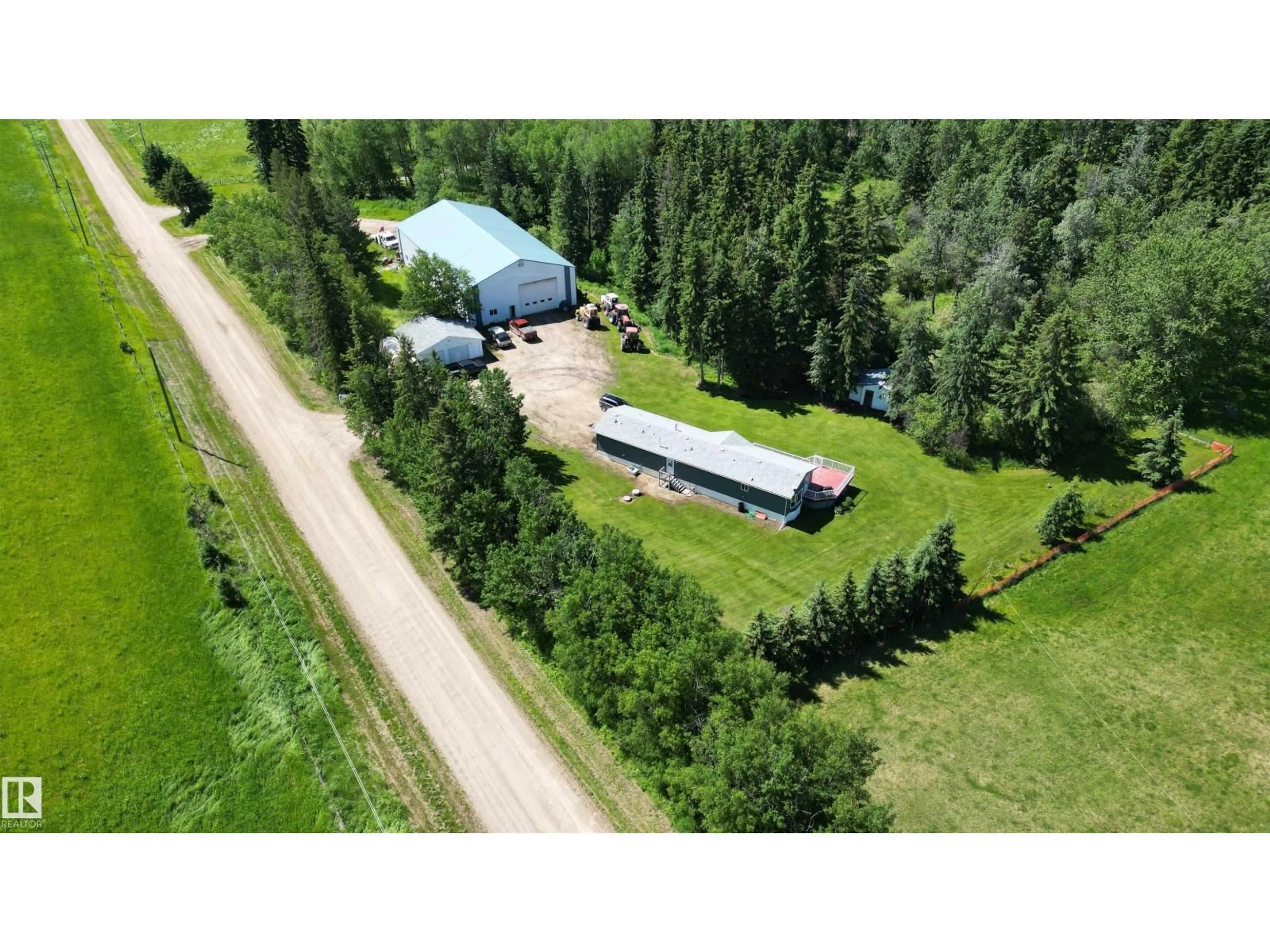 A pic from outside/outdoor area/front of a property/back of a property/a pic from drone, unknown for 56326 RGE RD 65, Rural Lac Ste. Anne County Alberta T0E2A0