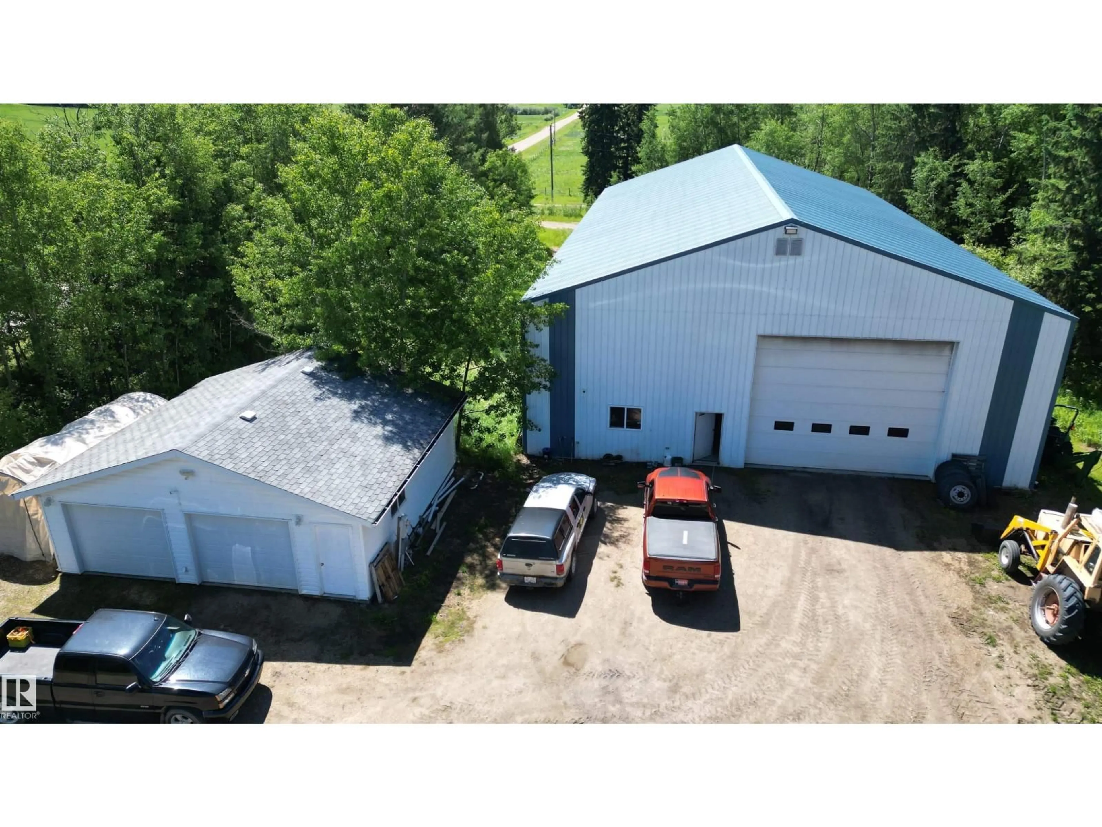 A pic from outside/outdoor area/front of a property/back of a property/a pic from drone, building for 56326 RGE RD 65, Rural Lac Ste. Anne County Alberta T0E2A0