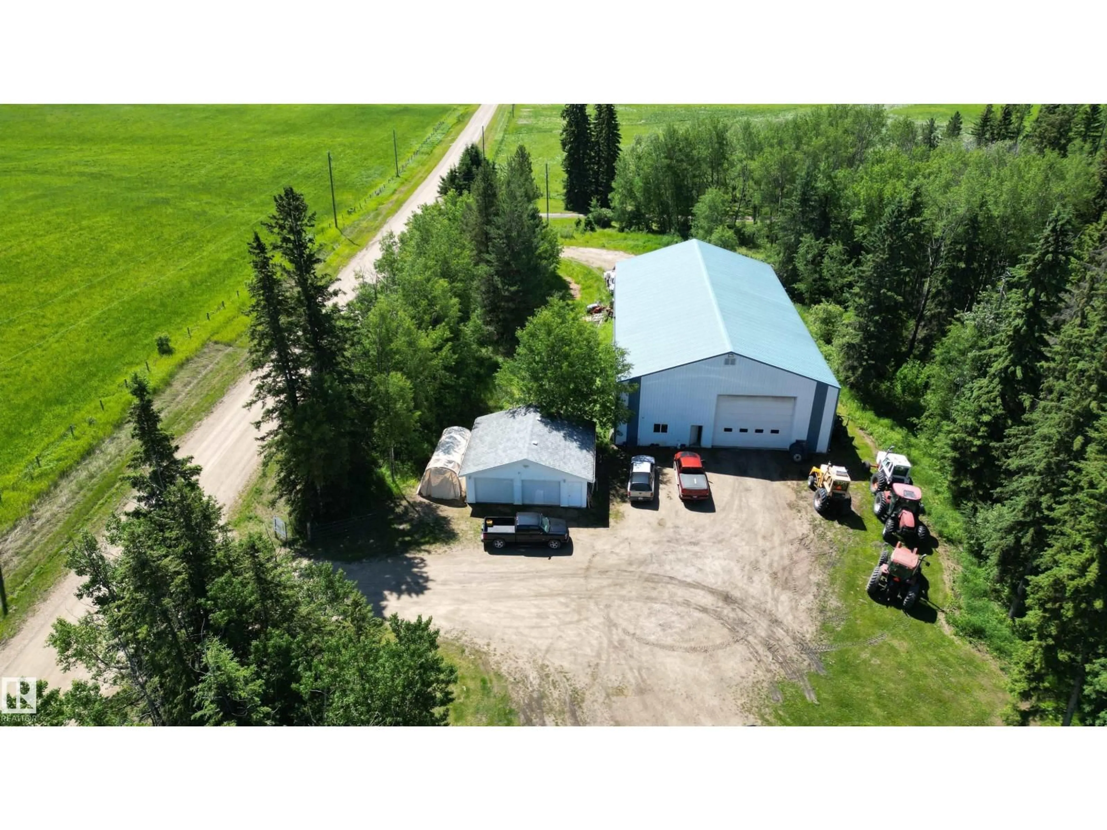 A pic from outside/outdoor area/front of a property/back of a property/a pic from drone, building for 56326 RGE RD 65, Rural Lac Ste. Anne County Alberta T0E2A0