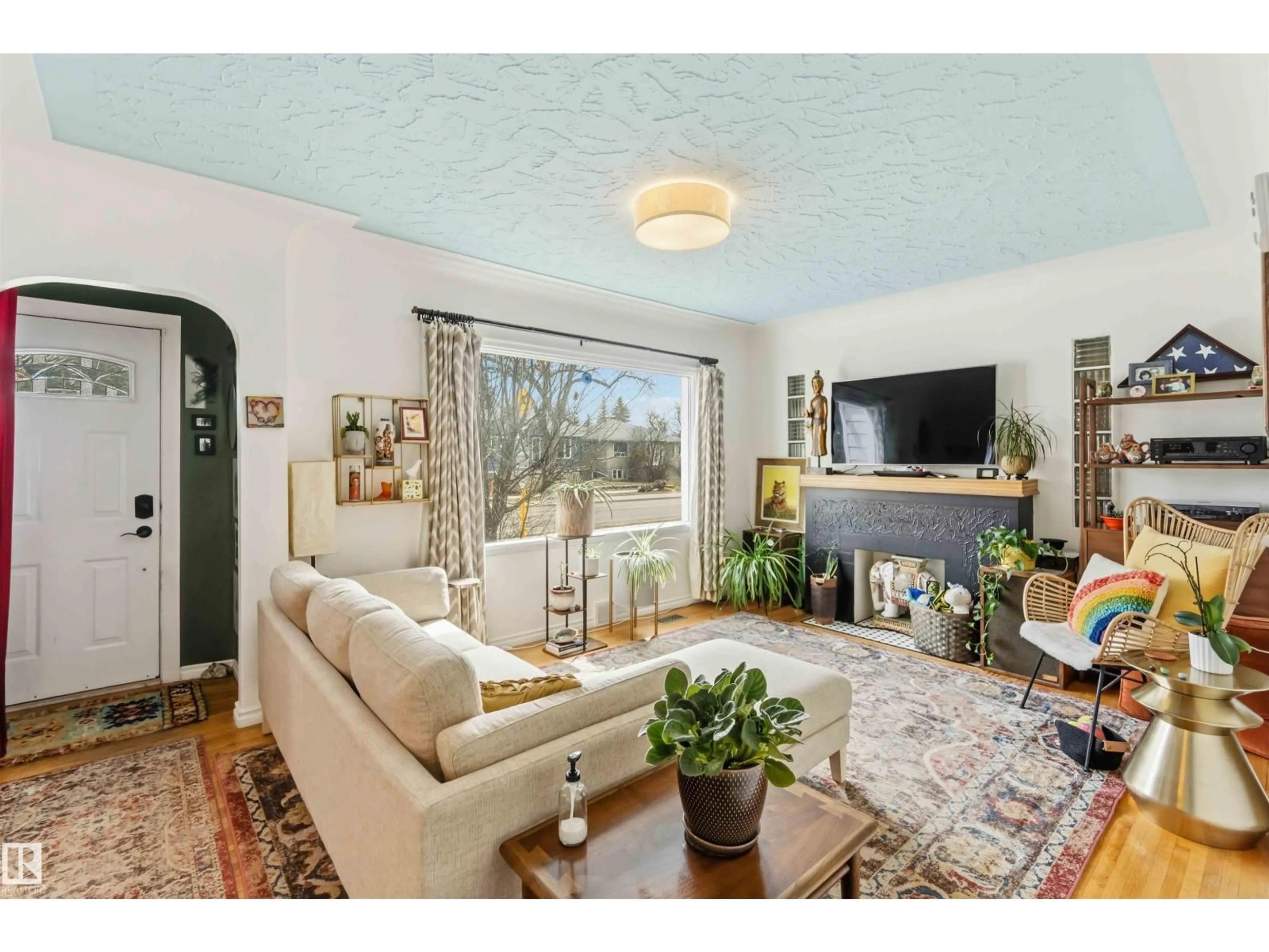 Living room with furniture, unknown for 6036 106 ST, Edmonton Alberta T6H2T7