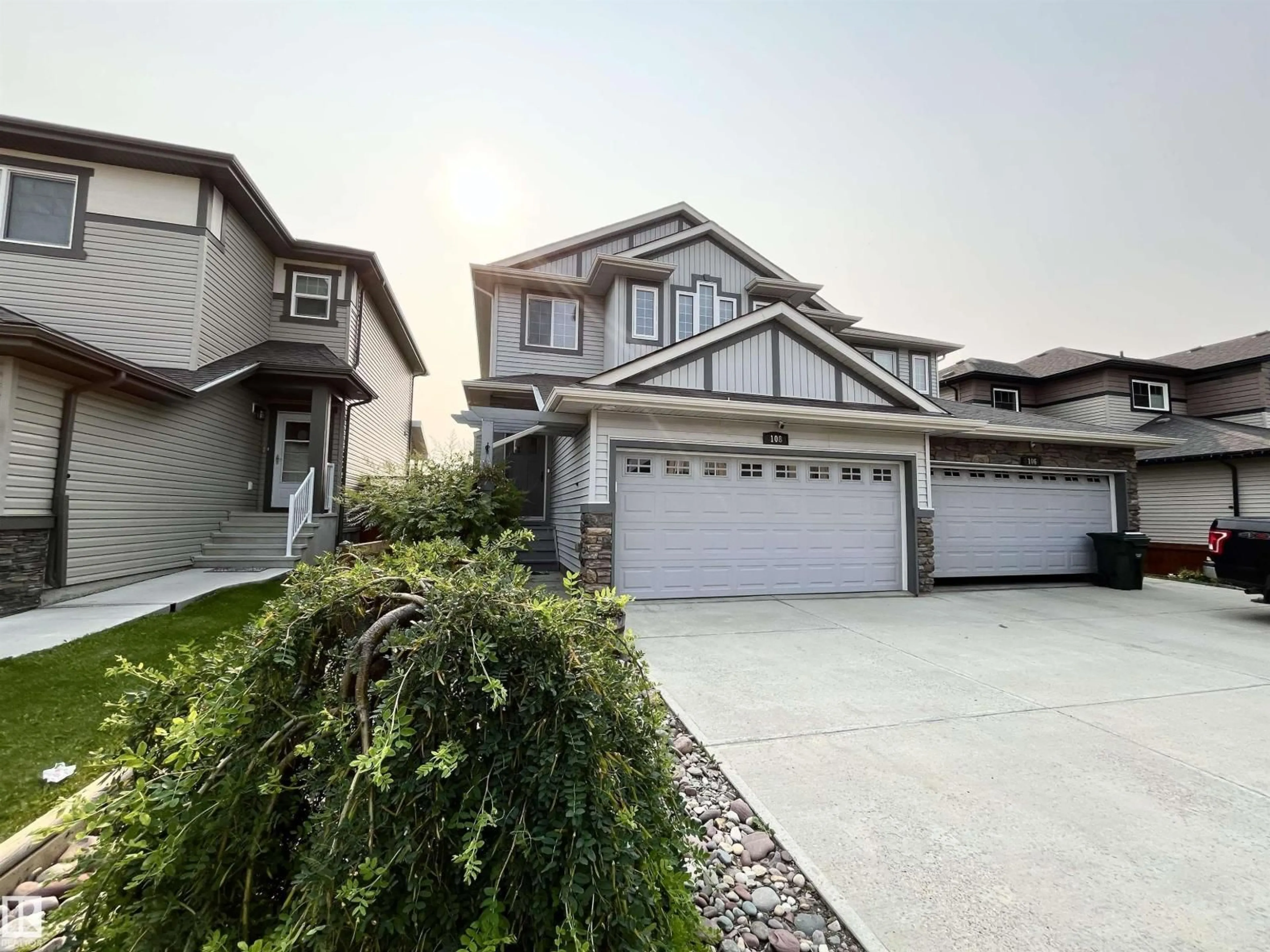 A pic from outside/outdoor area/front of a property/back of a property/a pic from drone, street for 108 SOUTH CREEK WD, Stony Plain Alberta T7Z0J9