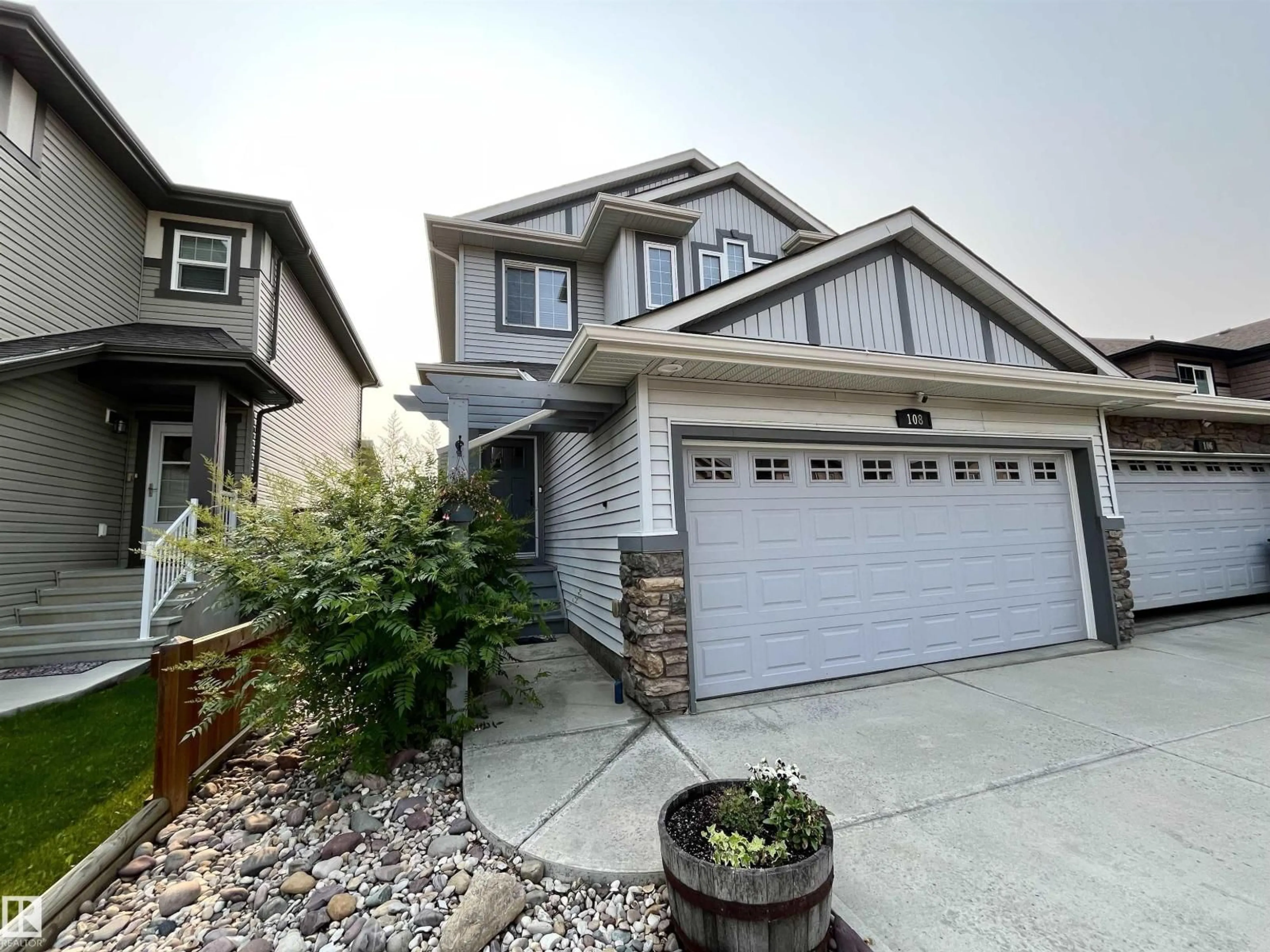 Home with vinyl exterior material, street for 108 SOUTH CREEK WD, Stony Plain Alberta T7Z0J9