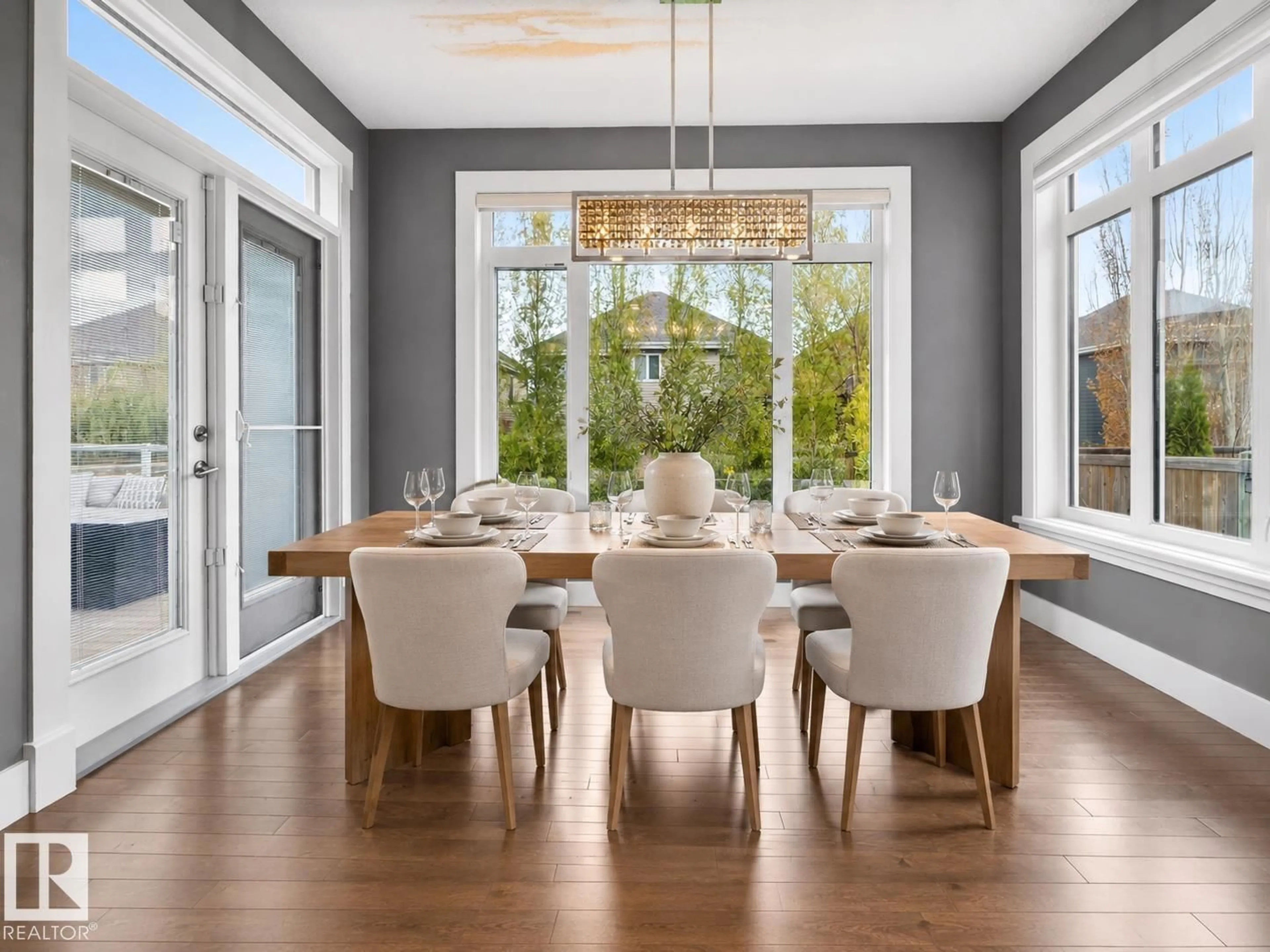Dining room, wood/laminate floor for SW - 9012 24 AV, Edmonton Alberta T6X1A6