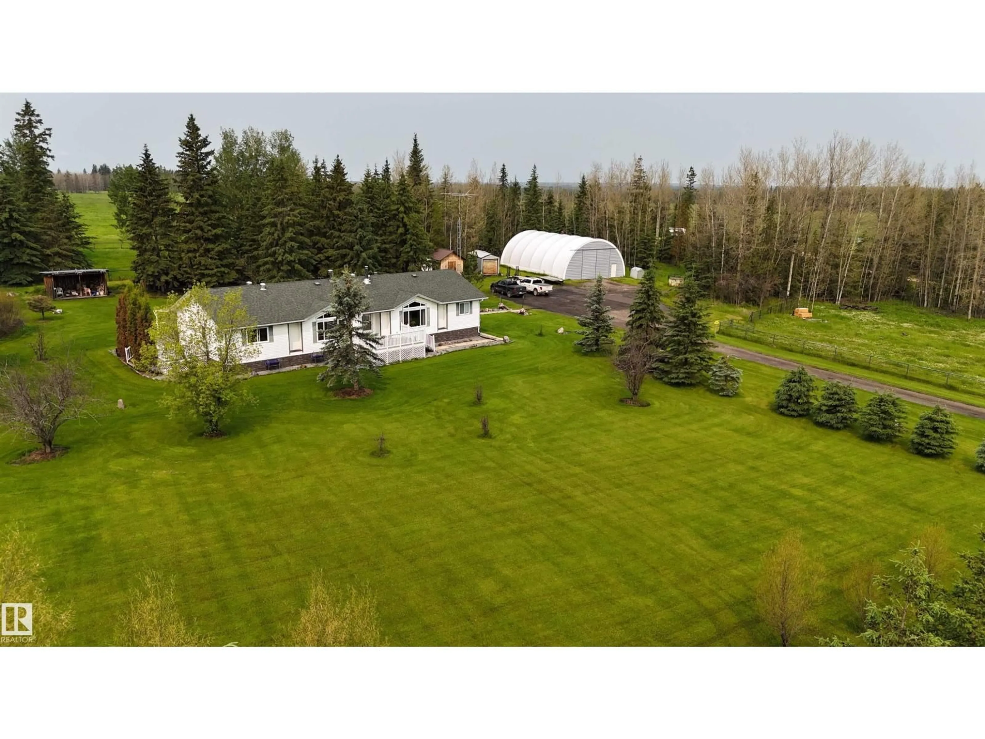 A pic from outside/outdoor area/front of a property/back of a property/a pic from drone, unknown for 461038 RR 71, Rural Wetaskiwin County Alberta T0C0A0