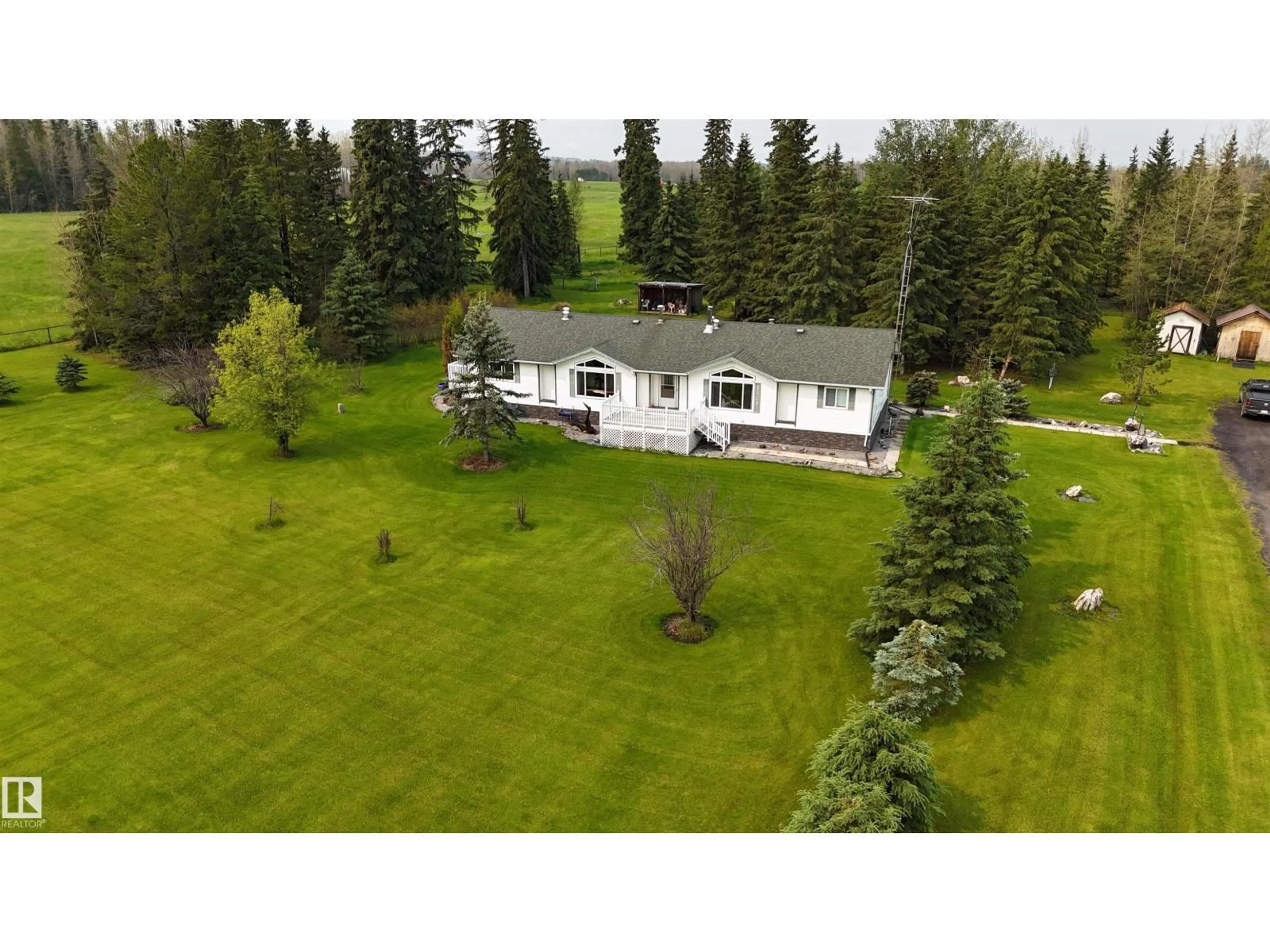 A pic from outside/outdoor area/front of a property/back of a property/a pic from drone, unknown for 461038 RR 71, Rural Wetaskiwin County Alberta T0C0A0
