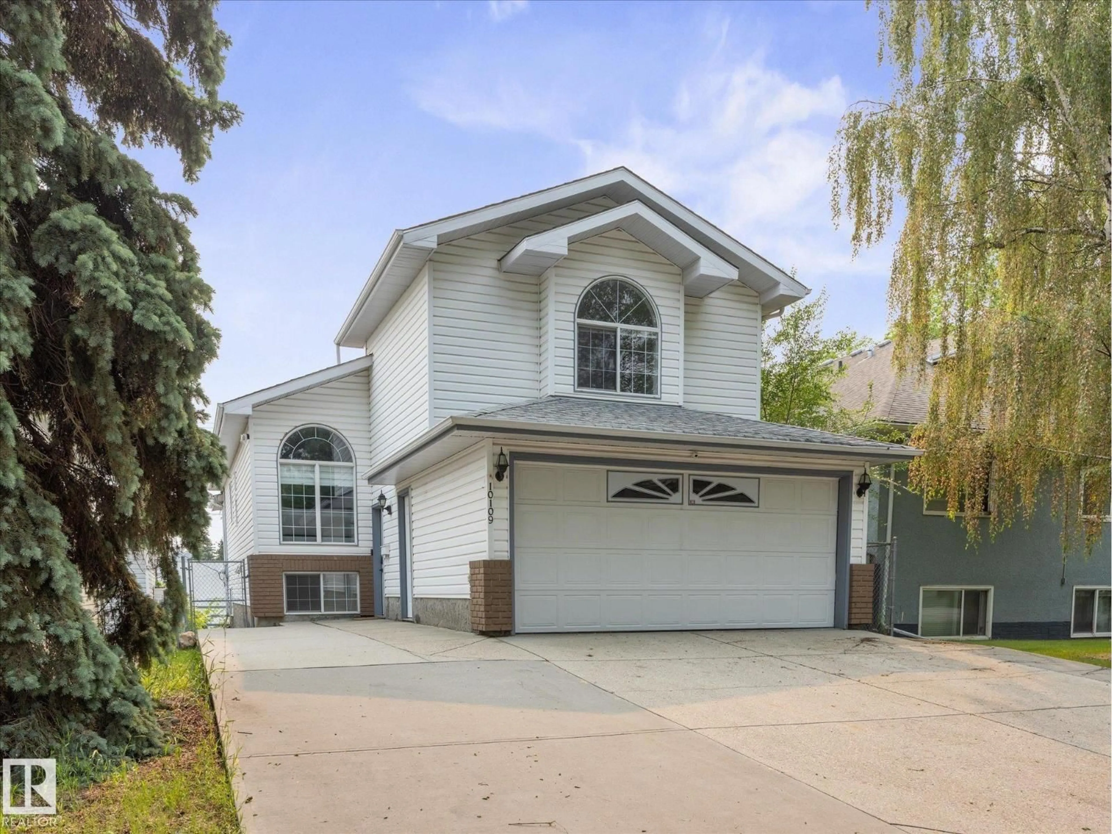 Home with vinyl exterior material, street for NW - 10109 80 ST, Edmonton Alberta T6A3H9