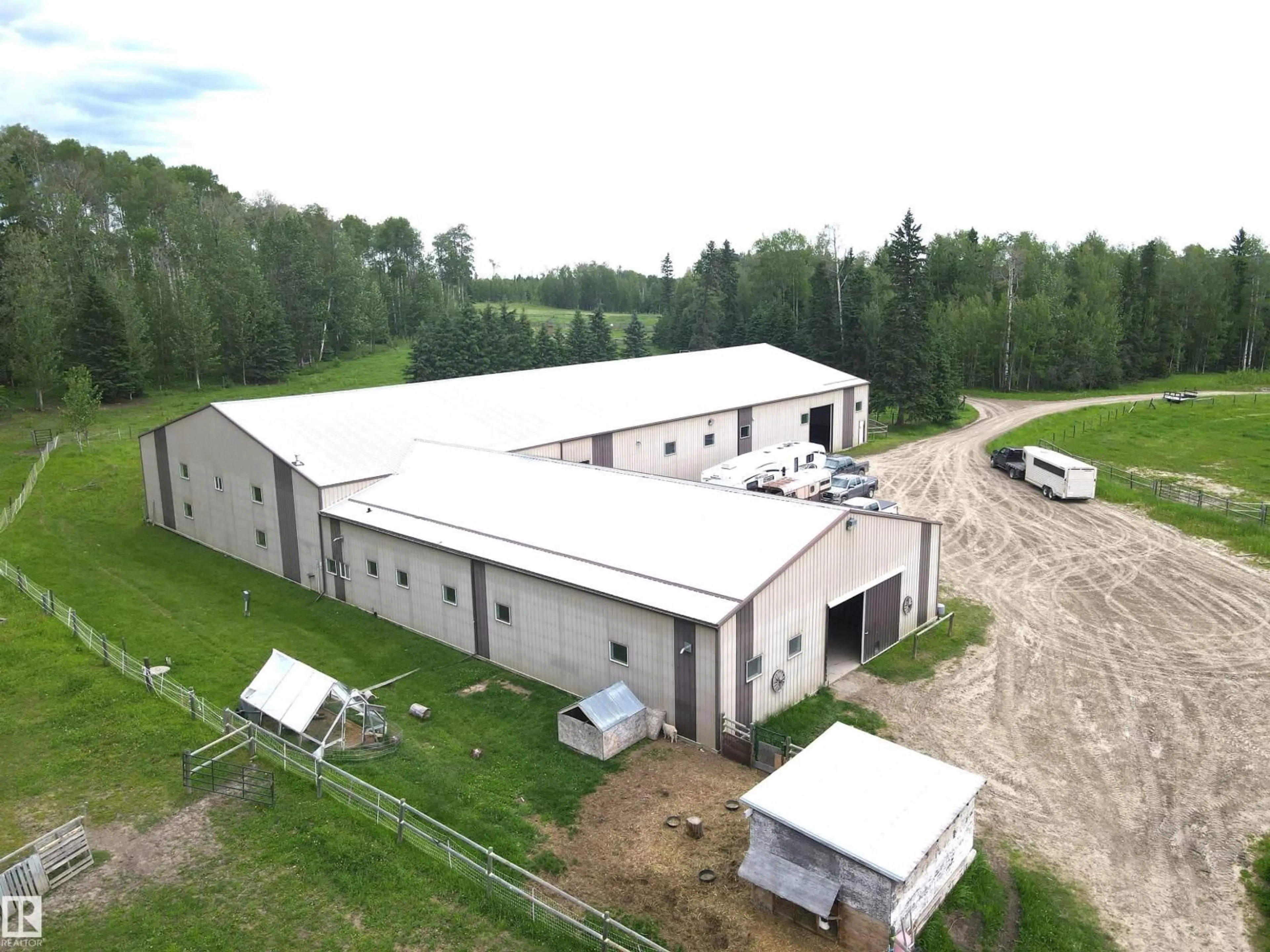 A pic from outside/outdoor area/front of a property/back of a property/a pic from drone, building for 411048C BUSTER CREEK RD, Rural Clearwater County Alberta T4T1A5