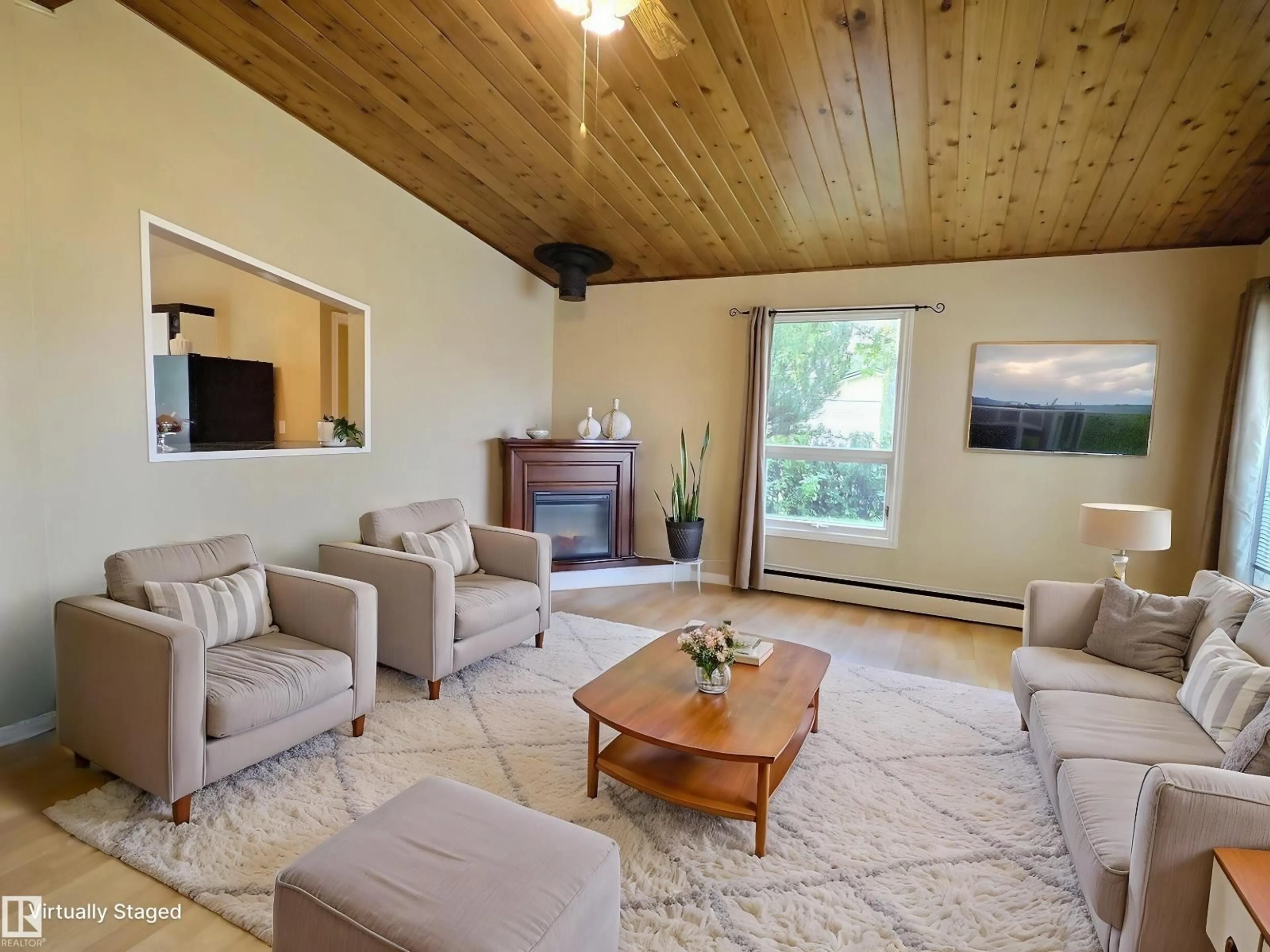 Living room with furniture, wood/laminate floor for 79 GROSVENOR BV, St. Albert Alberta T8N0X8