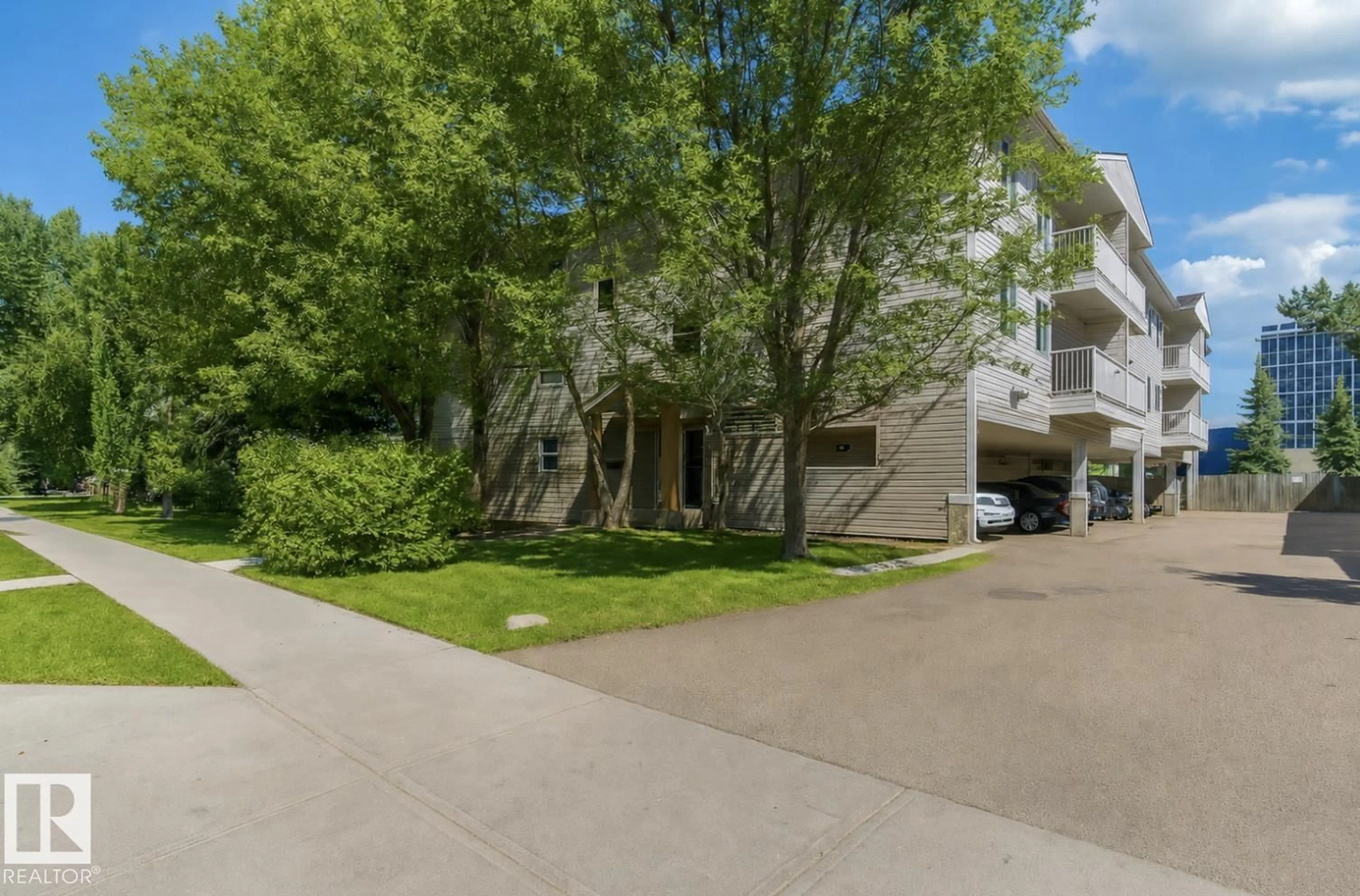 A pic from outside/outdoor area/front of a property/back of a property/a pic from drone, street for #103 - 12110 119 AVENUE AVENUE, Edmonton Alberta T5L5G9
