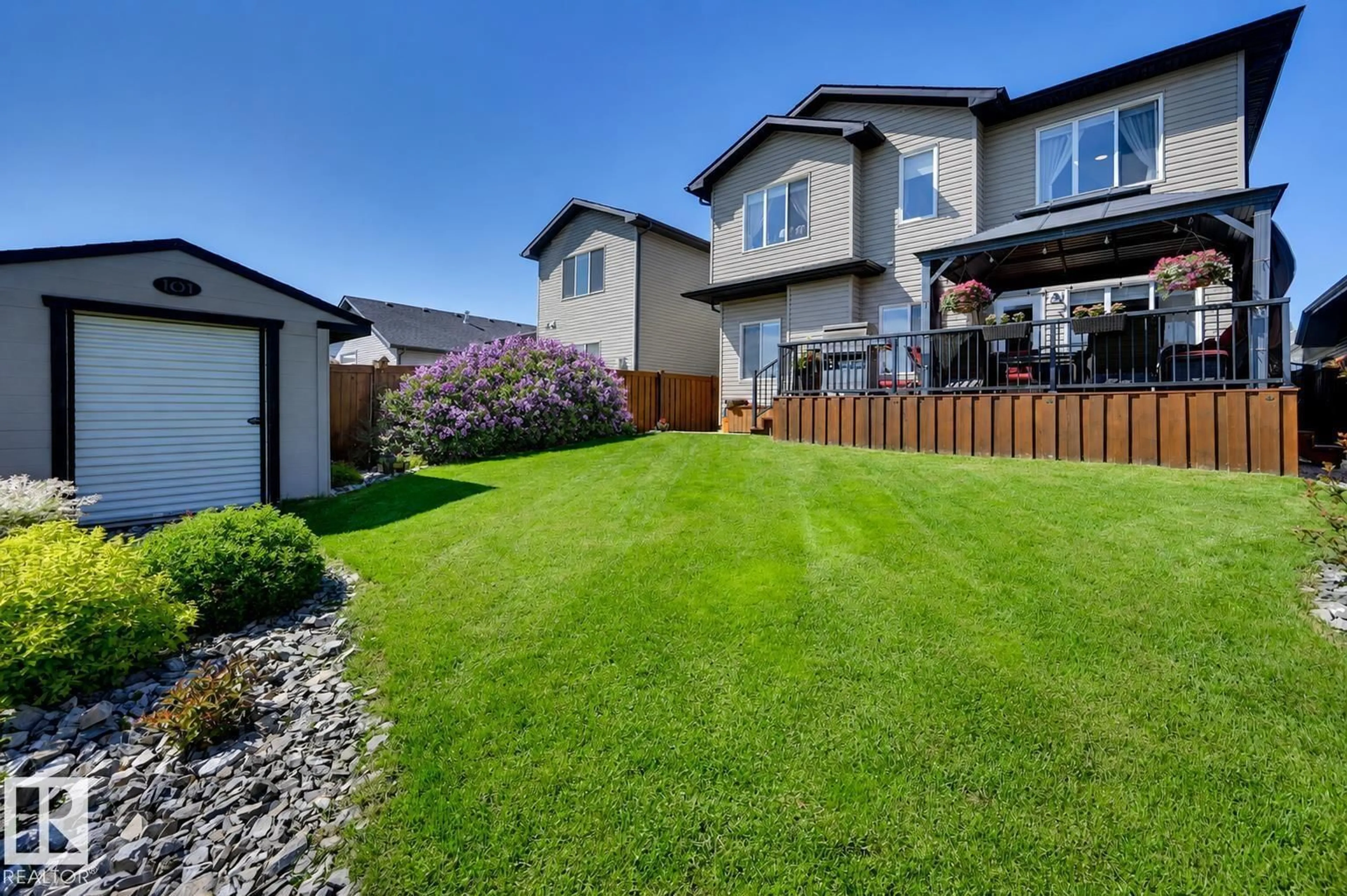 A pic from outside/outdoor area/front of a property/back of a property/a pic from drone, mountain view for 101 HILLDOWNS DR, Spruce Grove Alberta T7X0J1