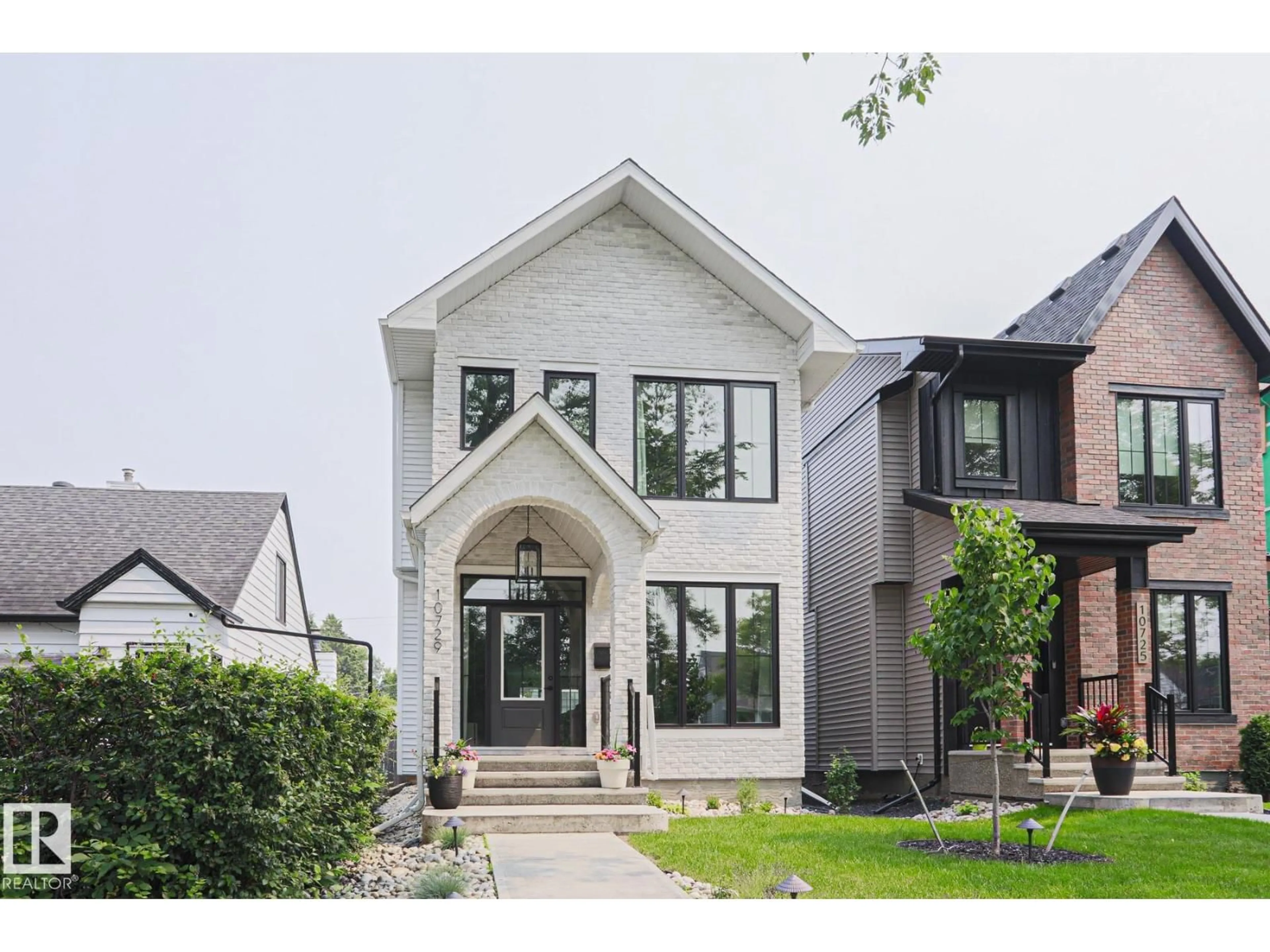 Home with brick exterior material, street for NW - 10729 129 ST, Edmonton Alberta T5M0X6