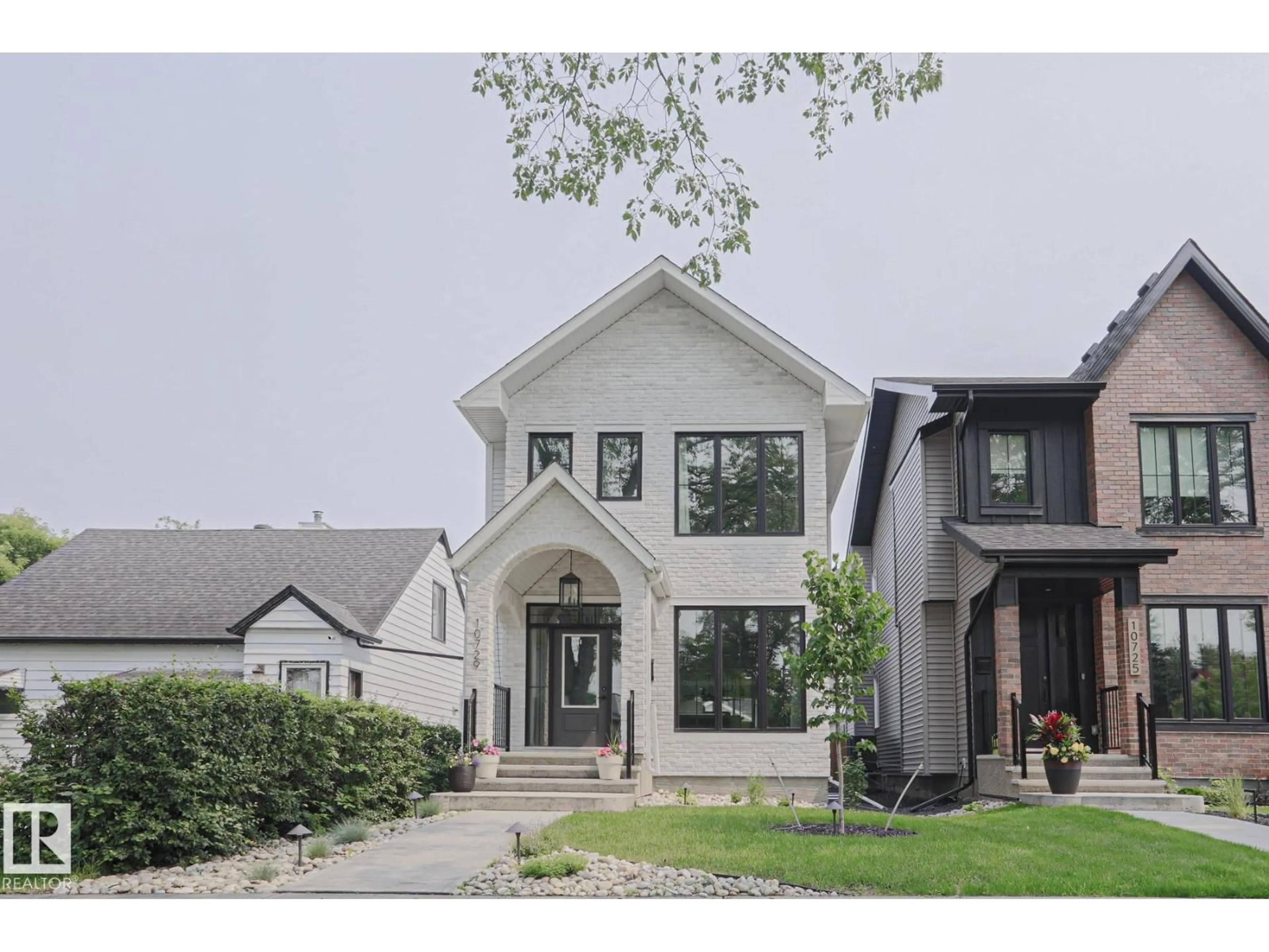 Home with brick exterior material, street for NW - 10729 129 ST, Edmonton Alberta T5M0X6