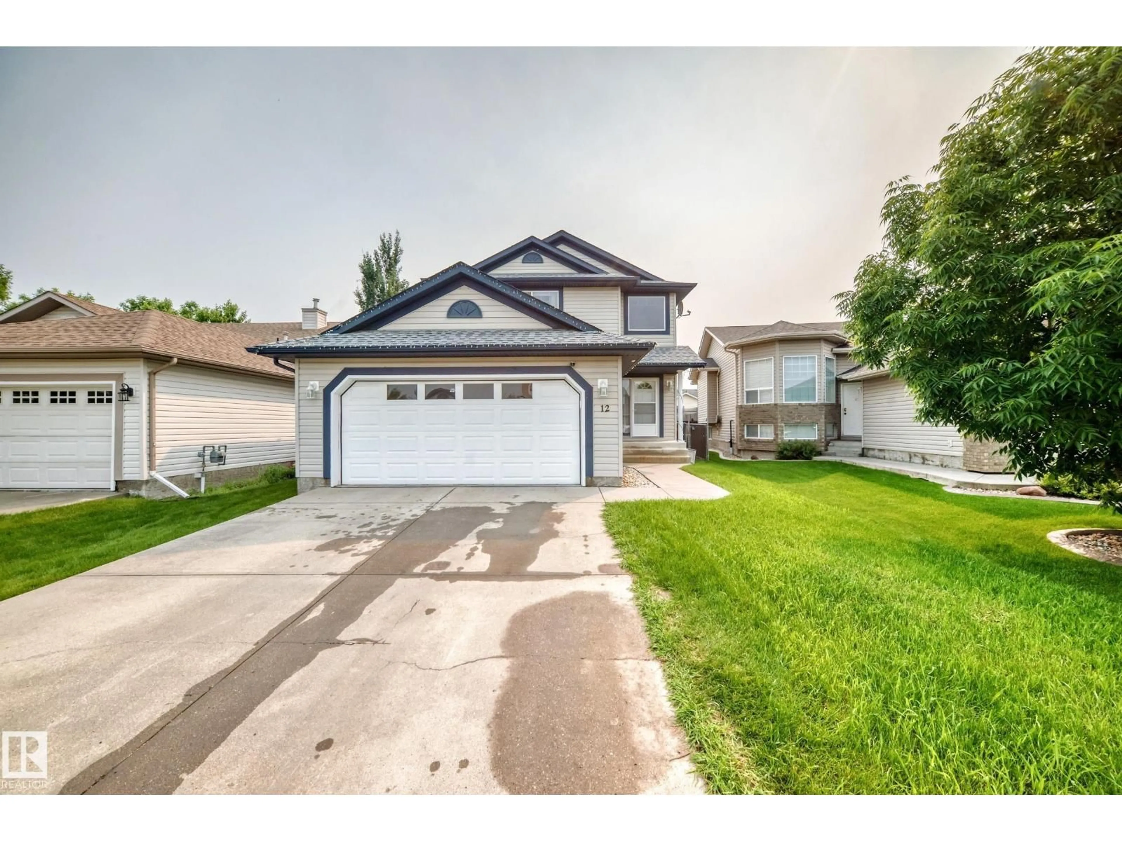 Home with vinyl exterior material, street for 12 HALSTED, Spruce Grove Alberta T7X2V6