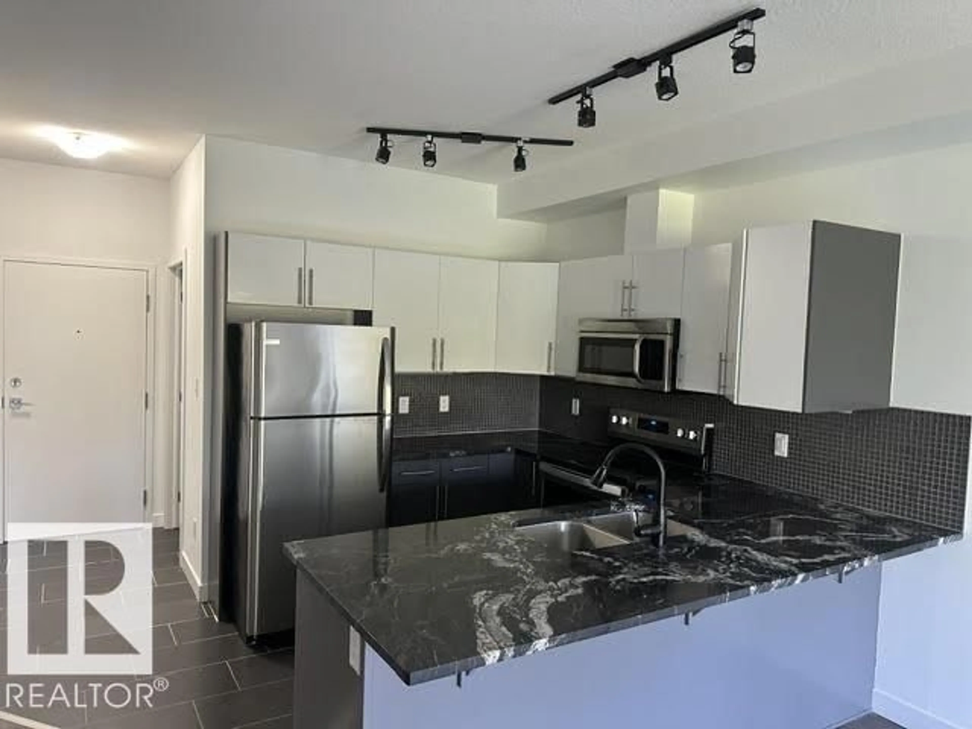 Open concept kitchen, unknown for #402 - 10611 117 ST, Edmonton Alberta T5H0G6