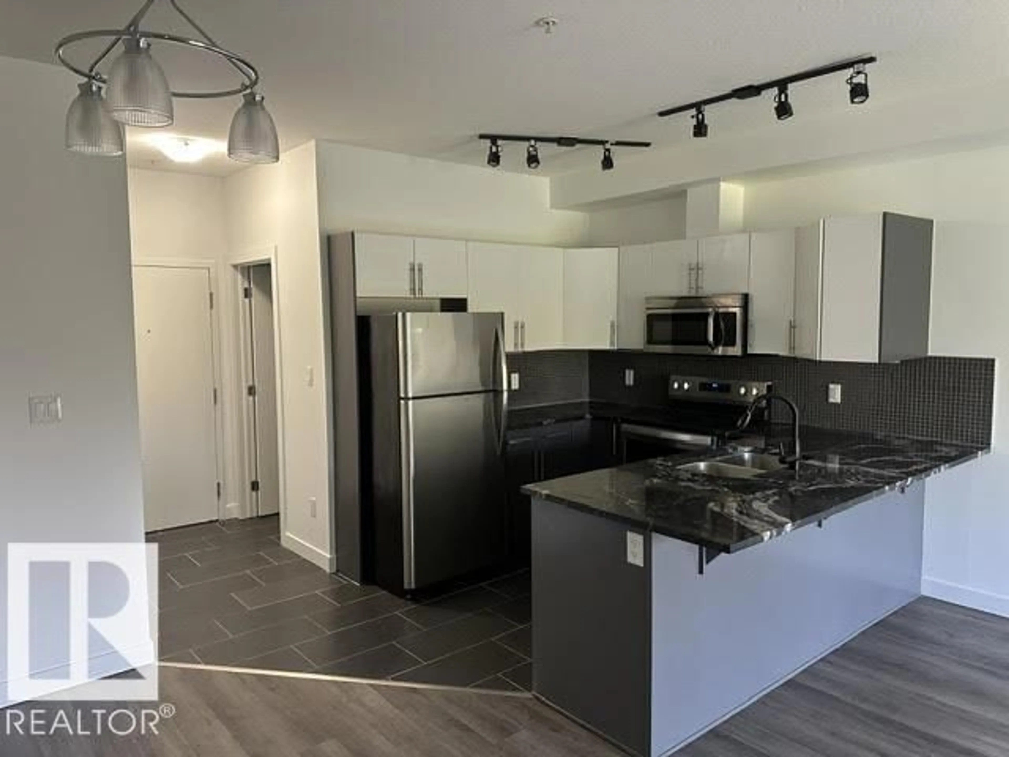 Open concept kitchen, unknown for #402 - 10611 117 ST, Edmonton Alberta T5H0G6