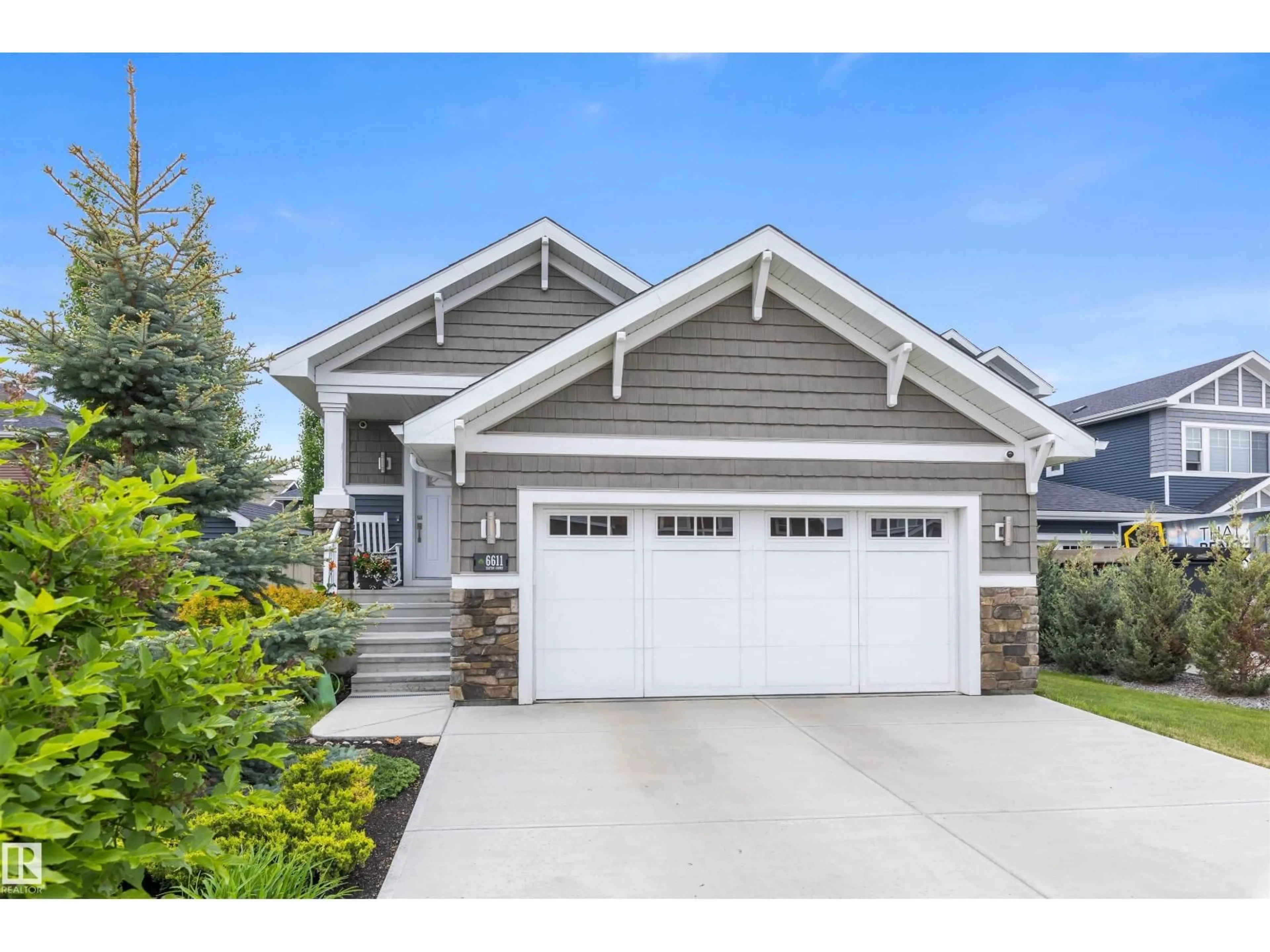 Home with vinyl exterior material, street for 6611 ELSTON CT, Edmonton Alberta T6M0T5