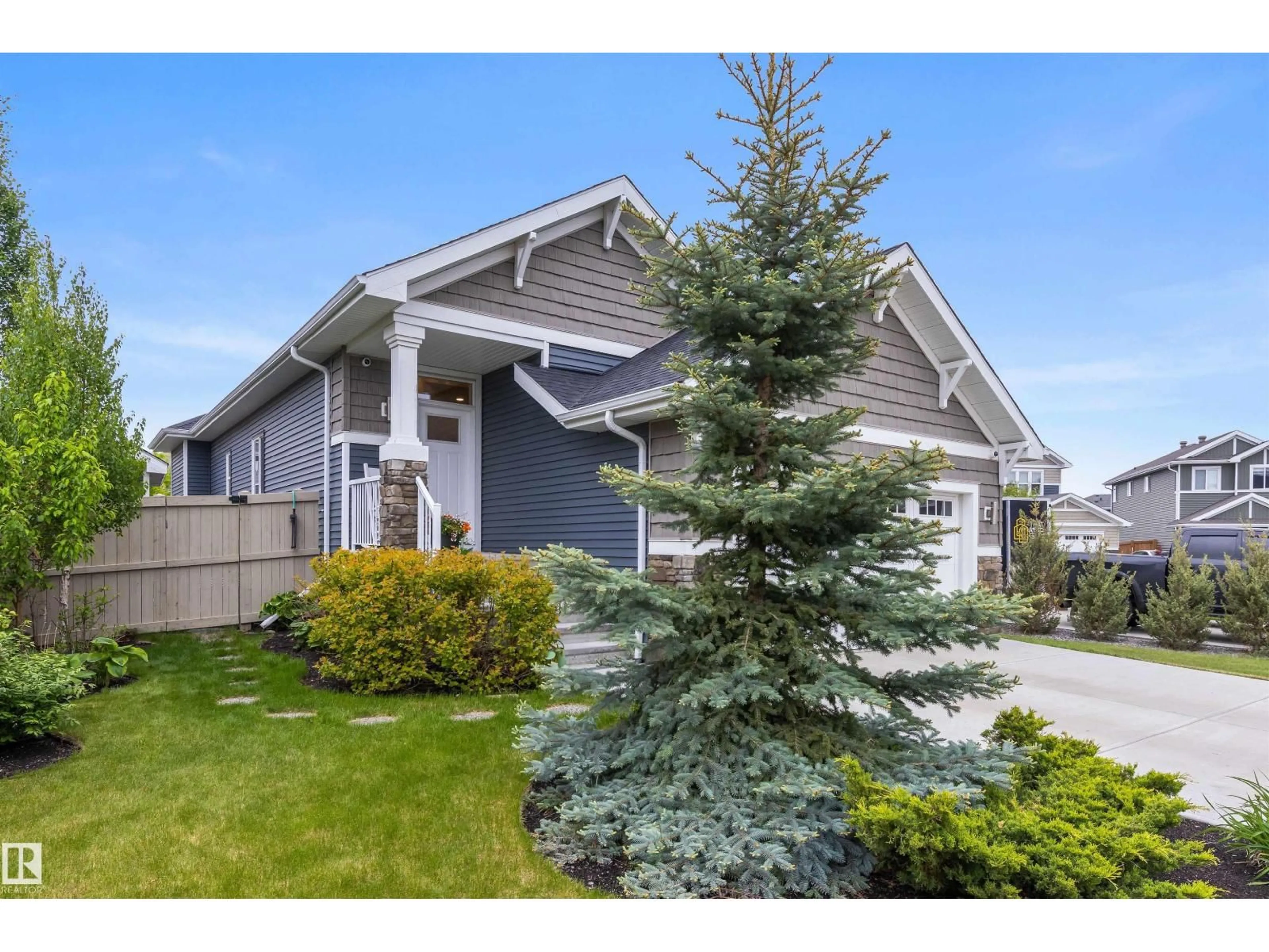 Home with vinyl exterior material, street for 6611 ELSTON CT, Edmonton Alberta T6M0T5