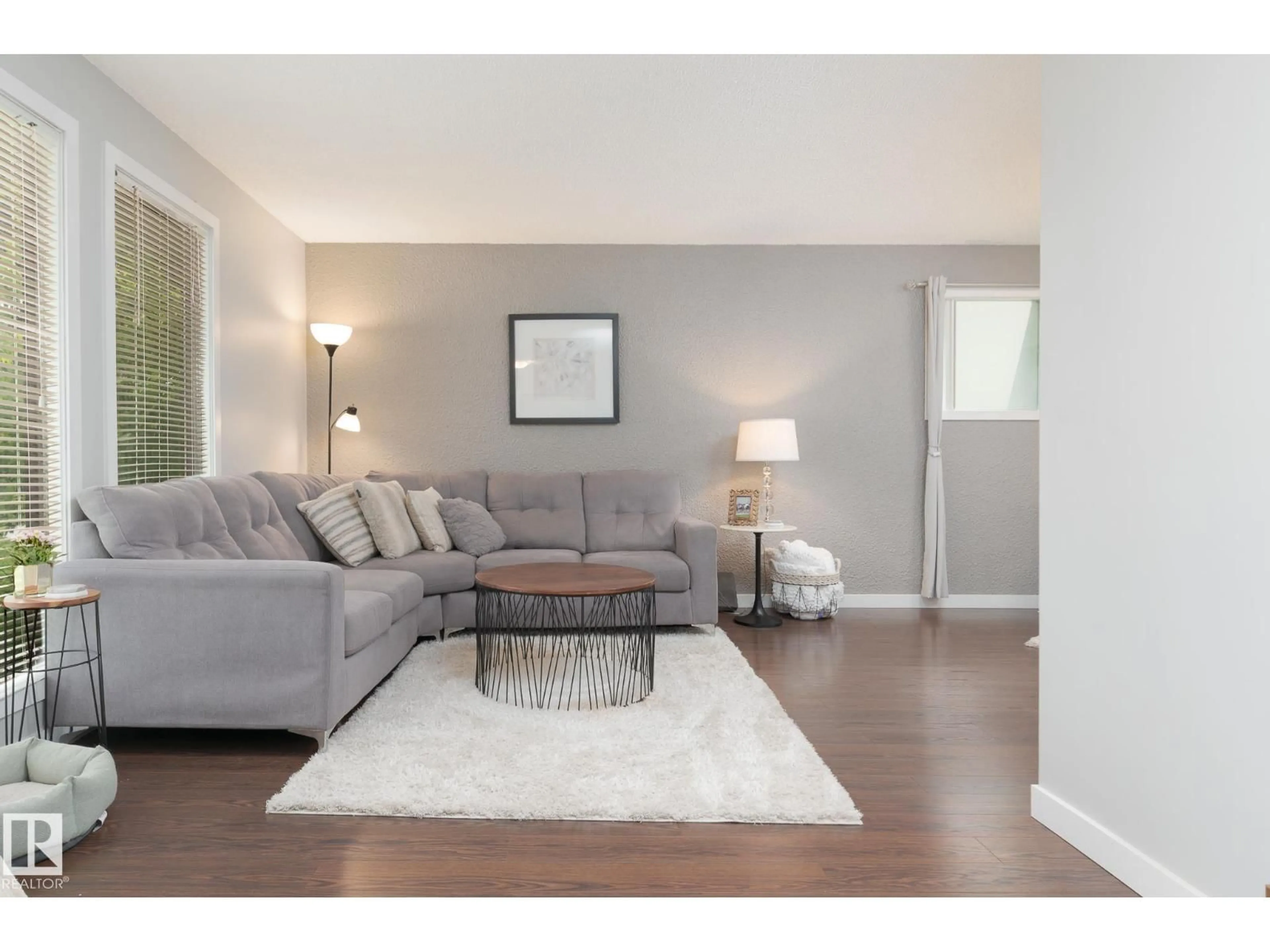 Living room with furniture, wood/laminate floor for 63 WAVERLEY CR, Spruce Grove Alberta T7X1N9