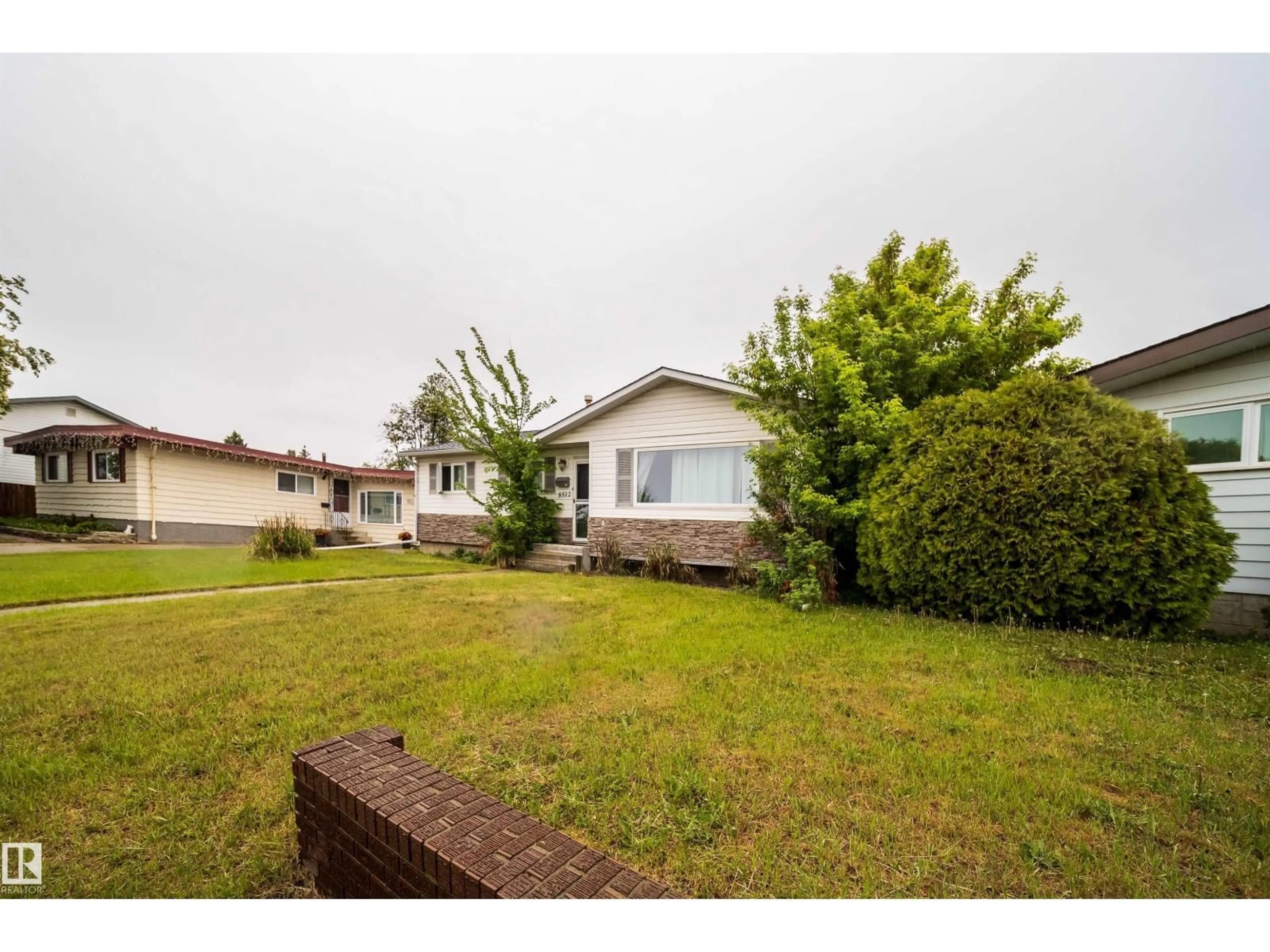 A pic from outside/outdoor area/front of a property/back of a property/a pic from drone, unknown for NW - 8512 142A AV, Edmonton Alberta T5E2G7