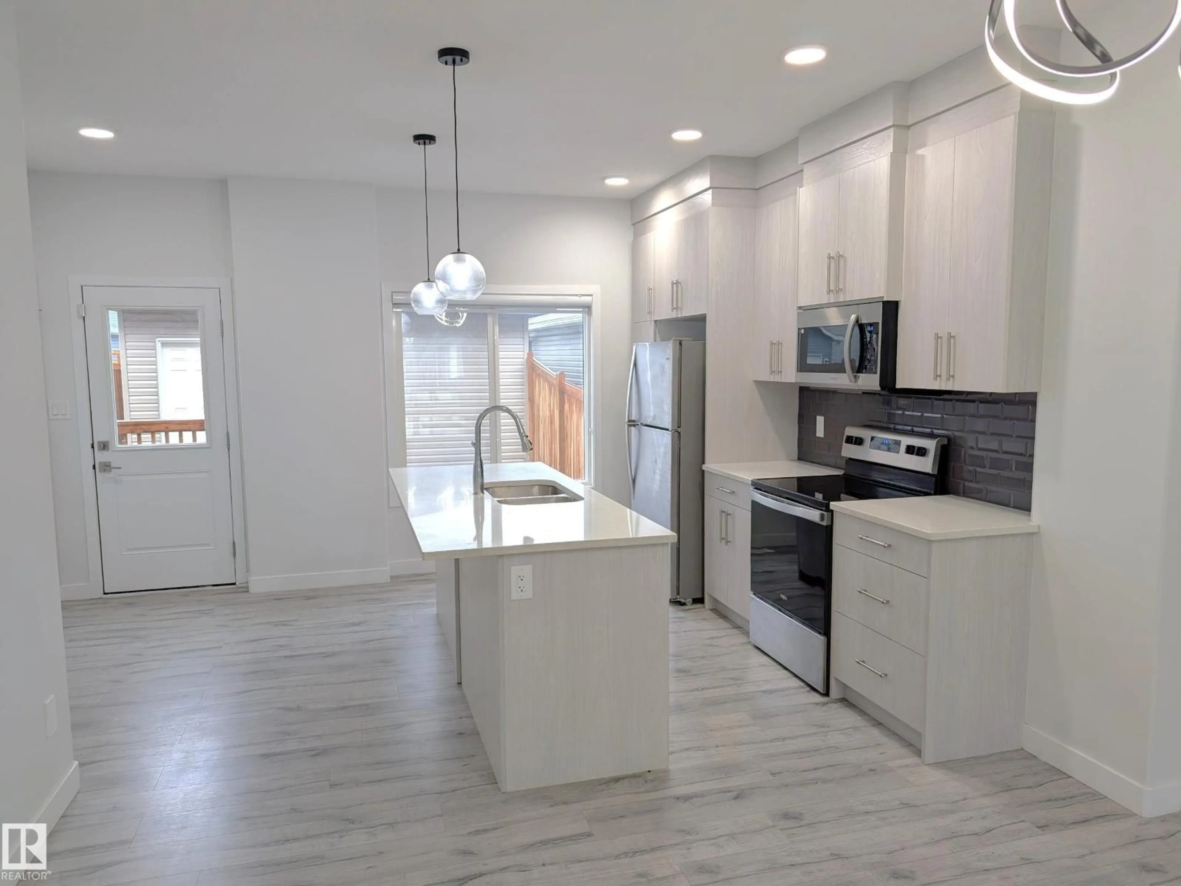 Open concept kitchen, ceramic/tile floor for 9455 COLAK LN, Edmonton Alberta T6W5B6