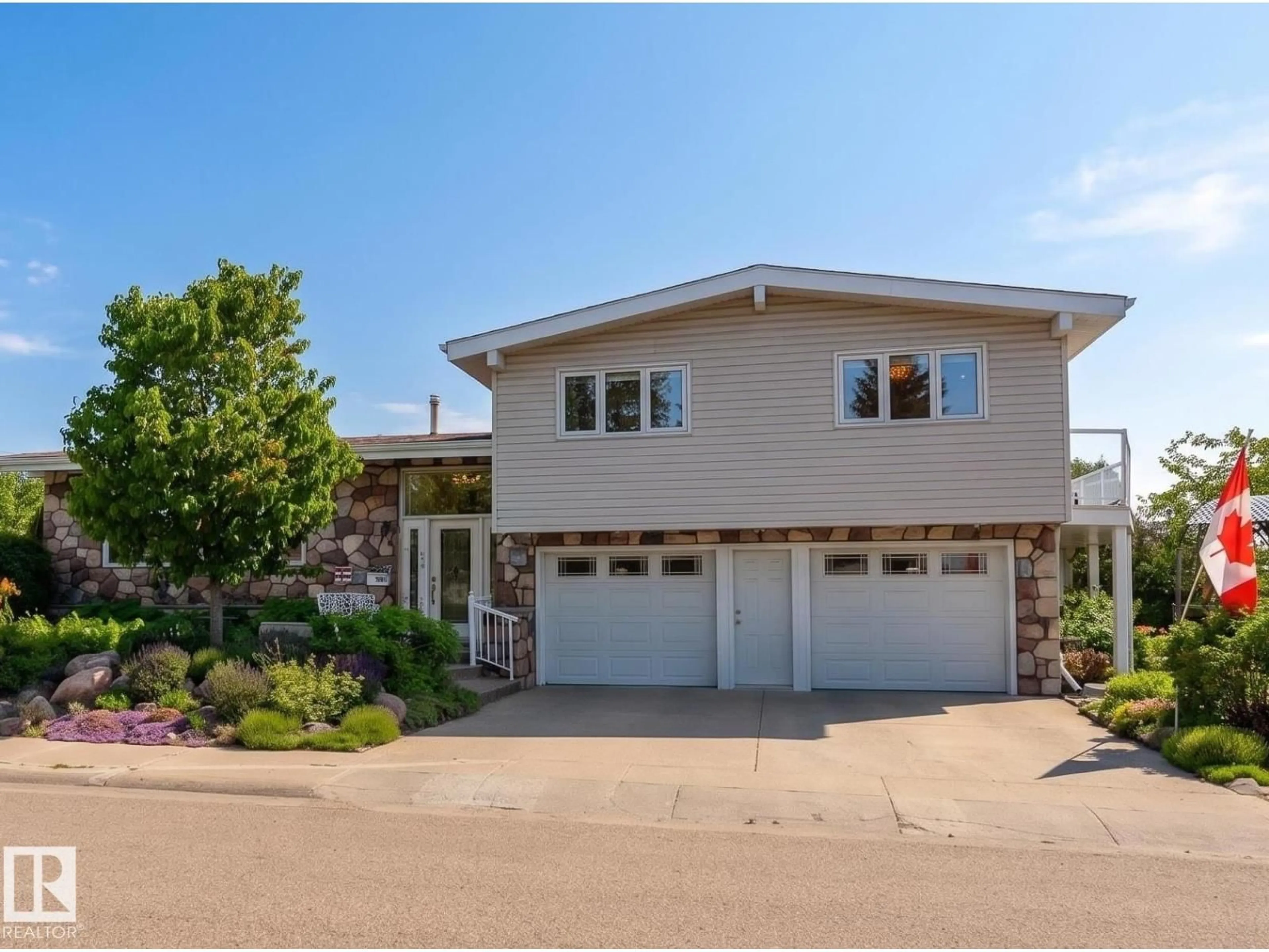 Home with vinyl exterior material, street for 7802 132A AV, Edmonton Alberta T5C2C4