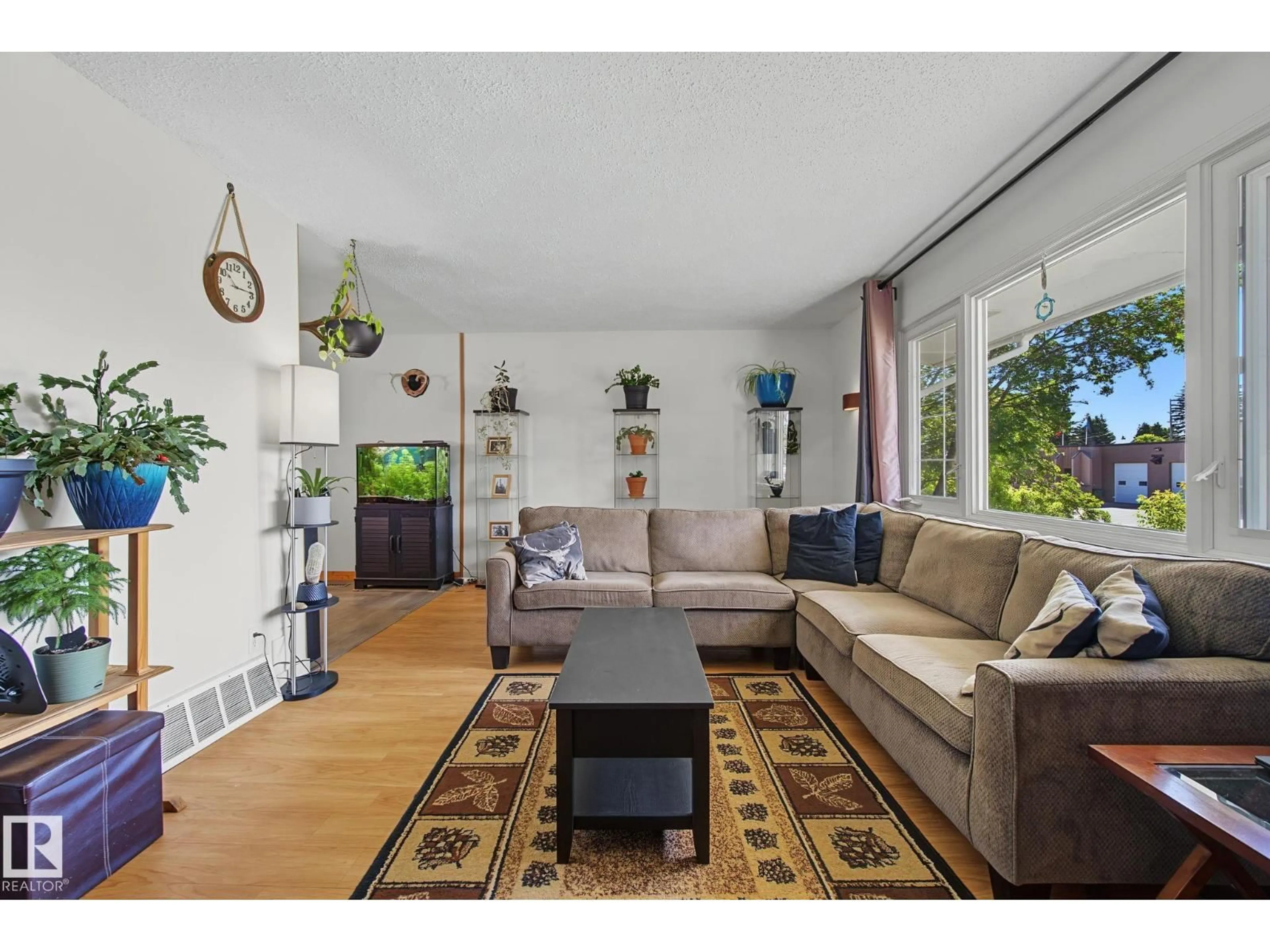 Living room with furniture, wood/laminate floor for 5116 49 AV, Onoway Alberta T0E1V0