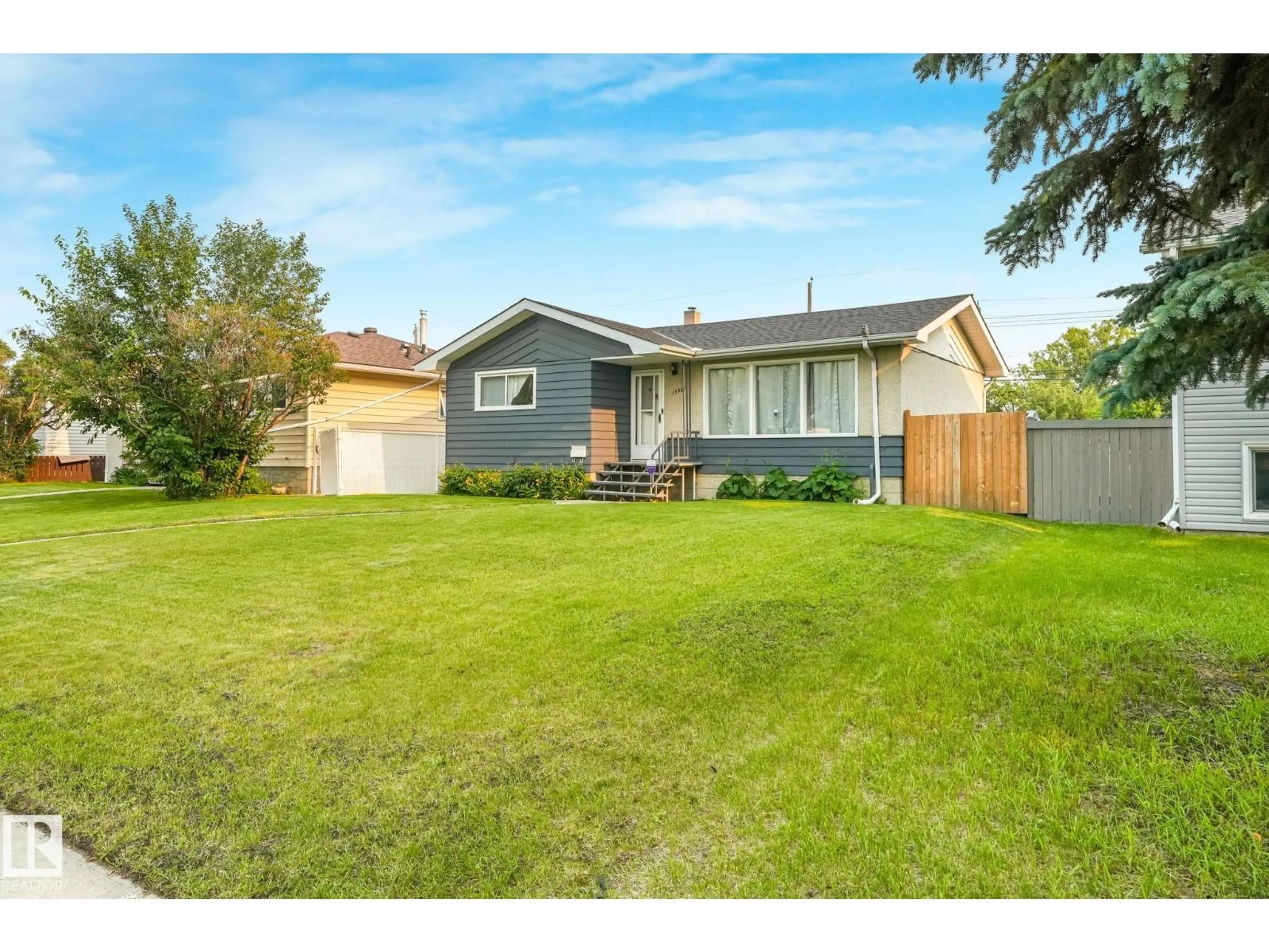 A pic from outside/outdoor area/front of a property/back of a property/a pic from drone, street for 13307 133 AV NW, Edmonton Alberta T5L3S8