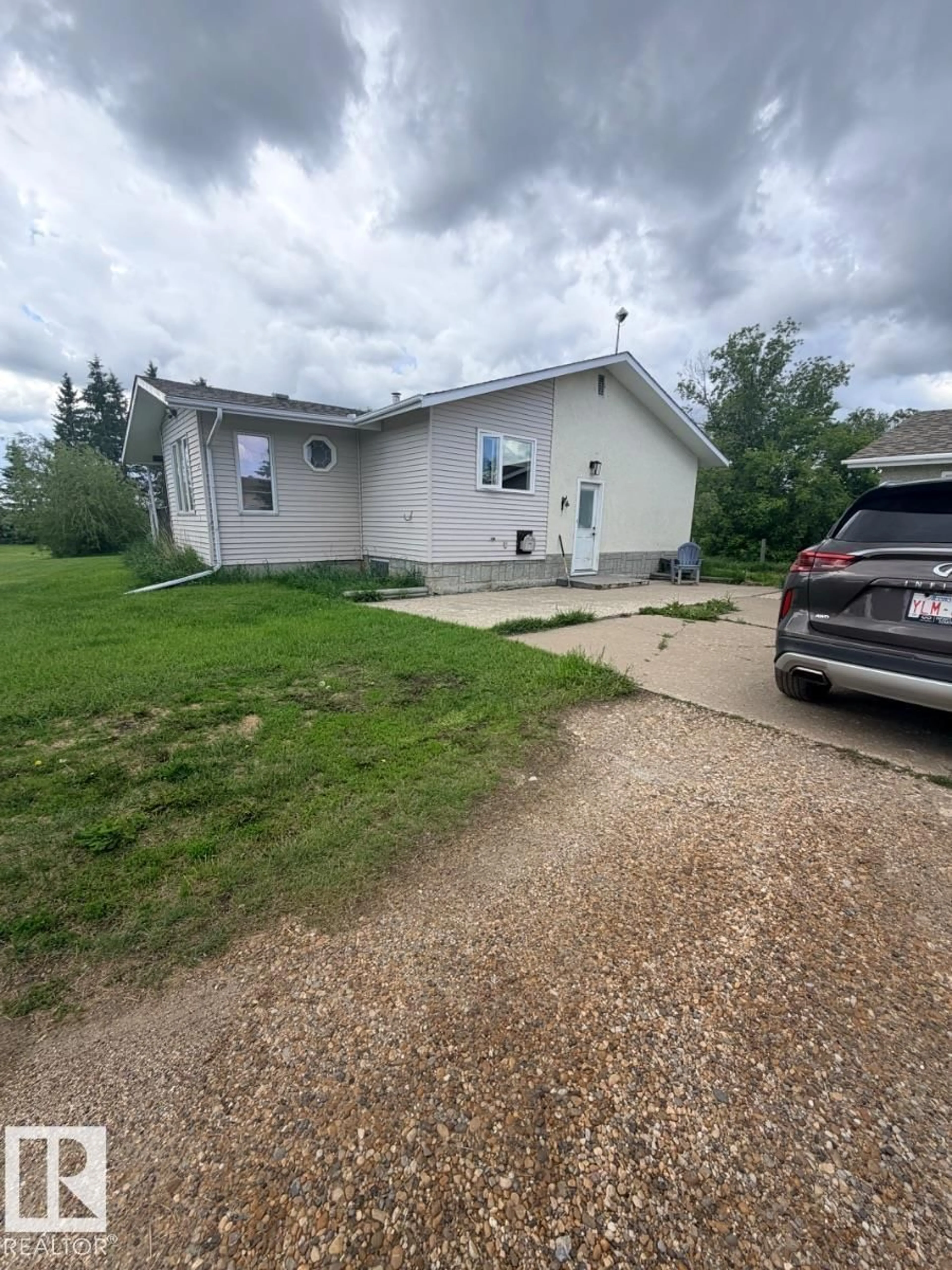 A pic from outside/outdoor area/front of a property/back of a property/a pic from drone, street for #2 - 24228 TWP ROAD 554, Rural Sturgeon County Alberta T0A0K5