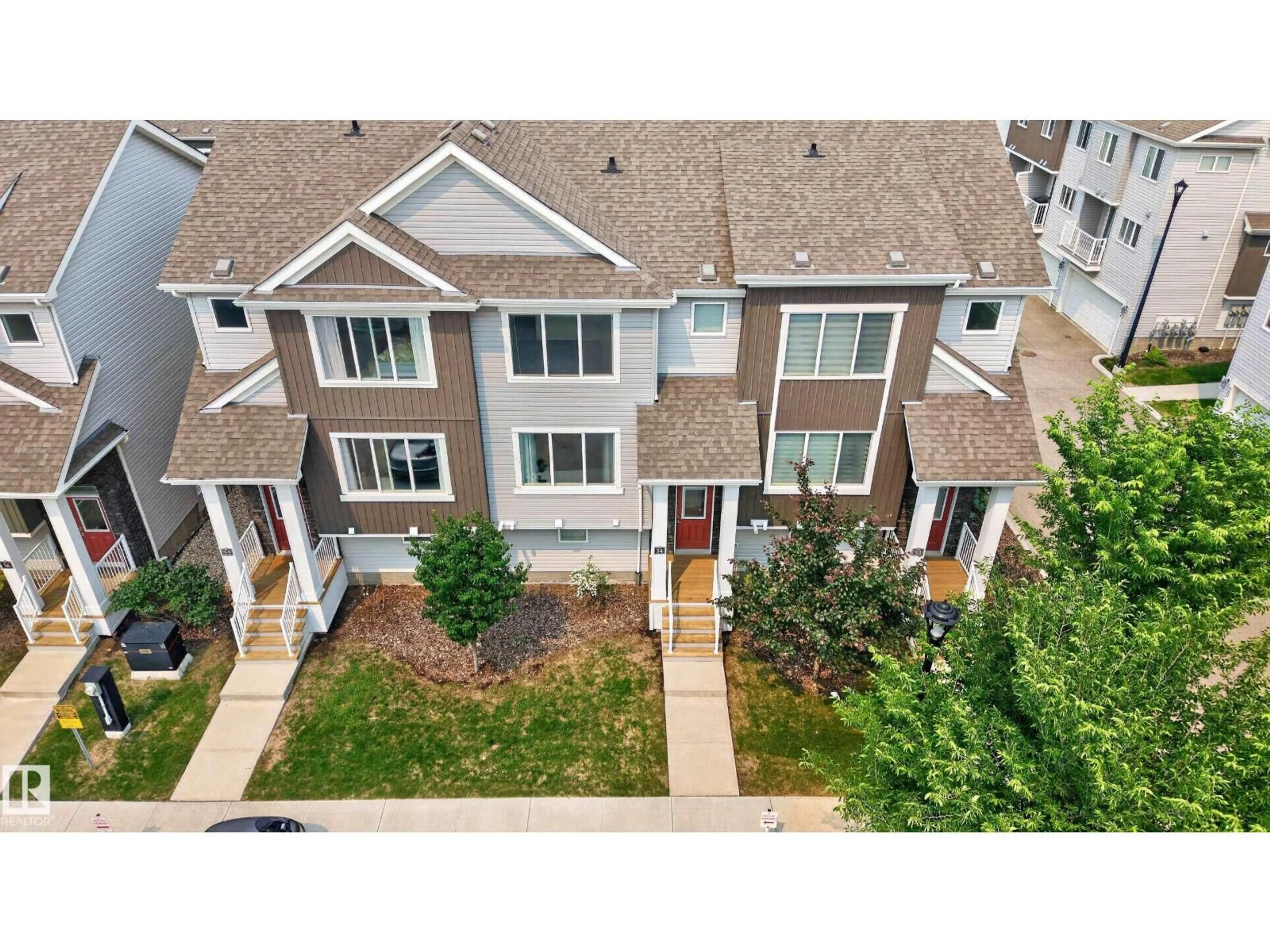 A pic from outside/outdoor area/front of a property/back of a property/a pic from drone, city buildings view from balcony for #34 - 2121 HADDOW DR, Edmonton Alberta T6R0W6
