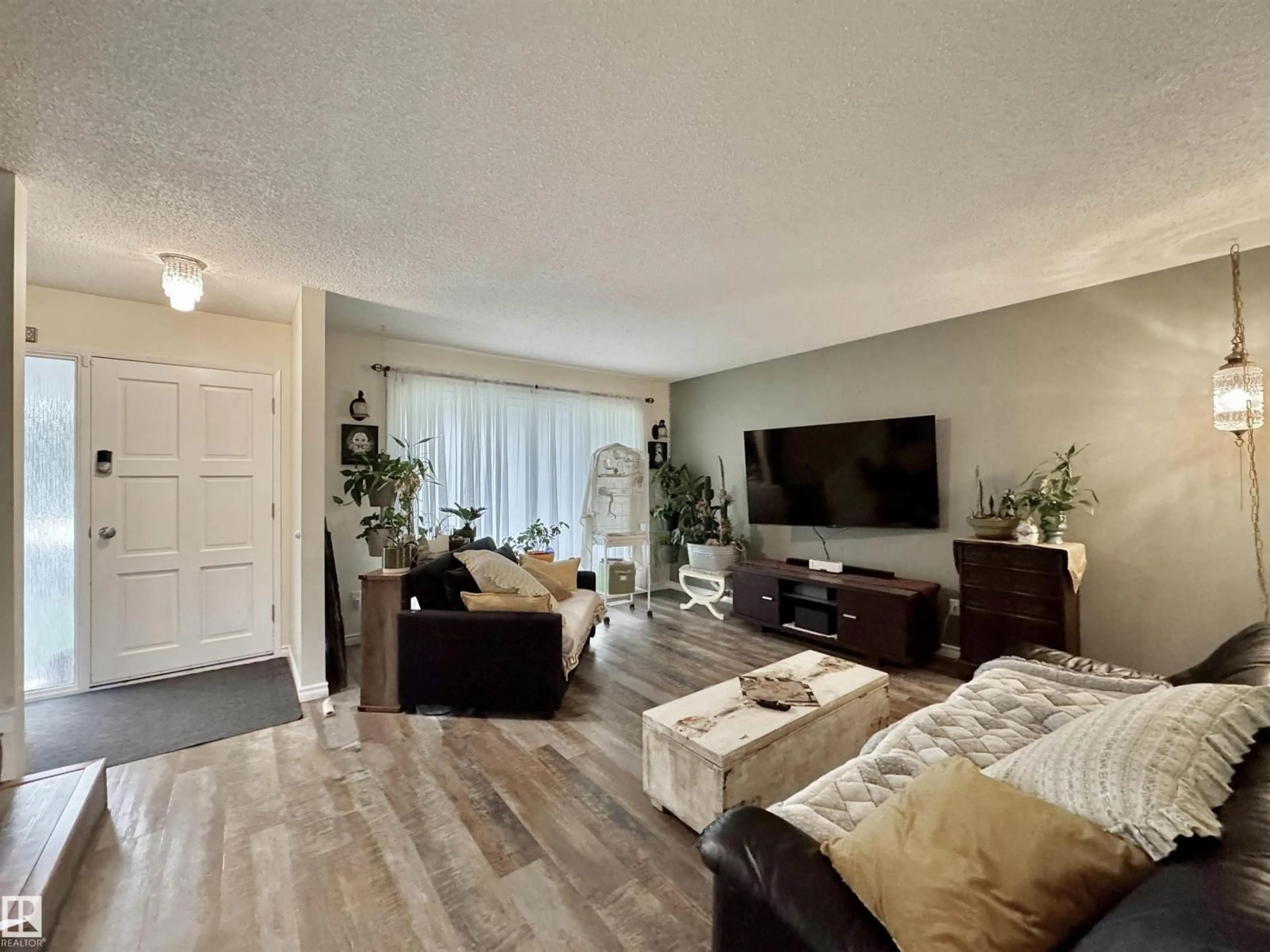 Living room with furniture, unknown for 9305 81A ST, Fort Saskatchewan Alberta T8L3M2